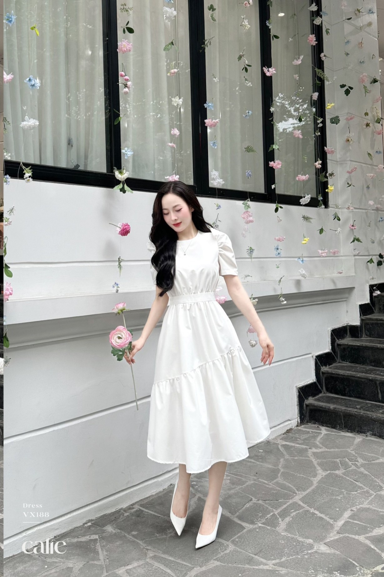 Váy dáng xòe tay bồng can nhún eo