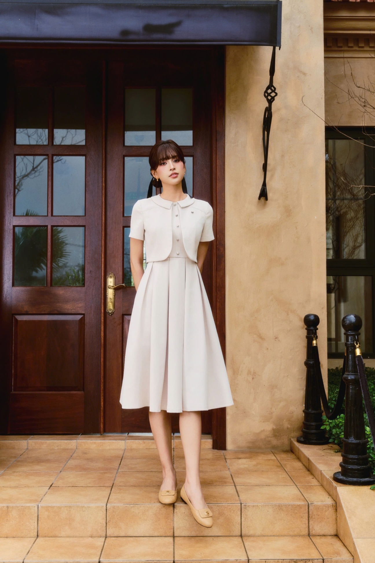 Váy dáng xòe giả sét đính nơ ngực