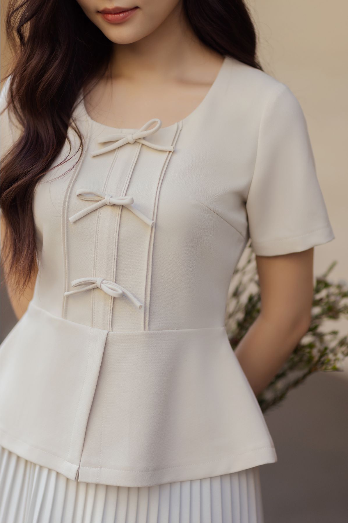 Áo peplum cổ vuông đính nơ nữ tính