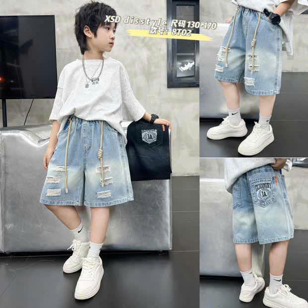 8T02 - Quần ngố bò xanh rách
