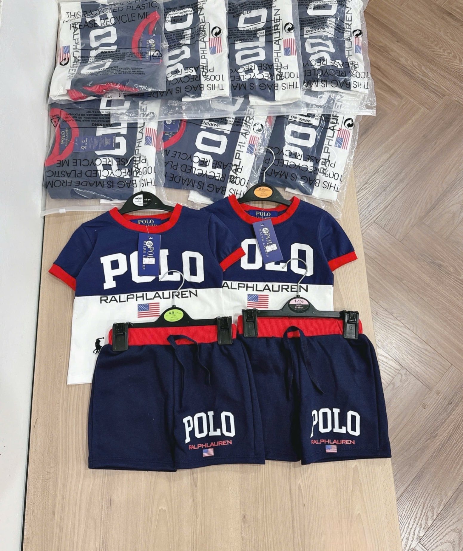 BỘ POLO THAN PHỐI TRẮNG CỔ VIỀN ĐỎ