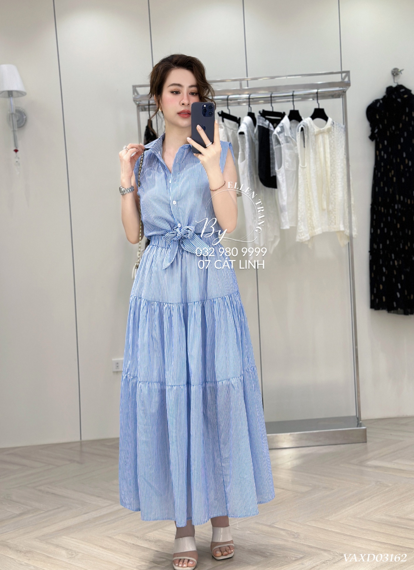 VÁY XANH DƯƠNG KẺ DỌC TRẮNG KHÔNG TAY