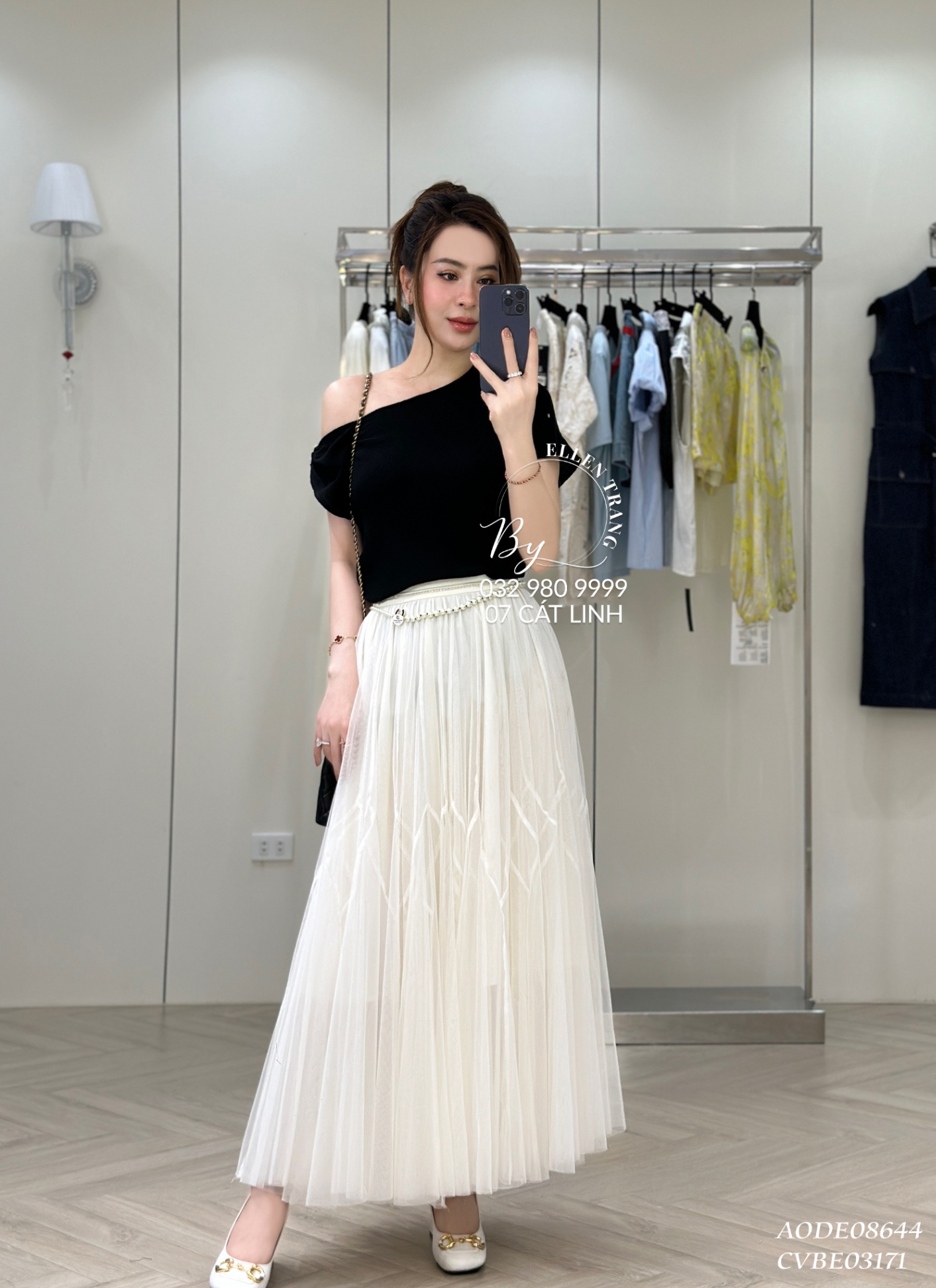ÁO ĐEN LỆCH VAI KHUY CÀI TRÁI TIM
