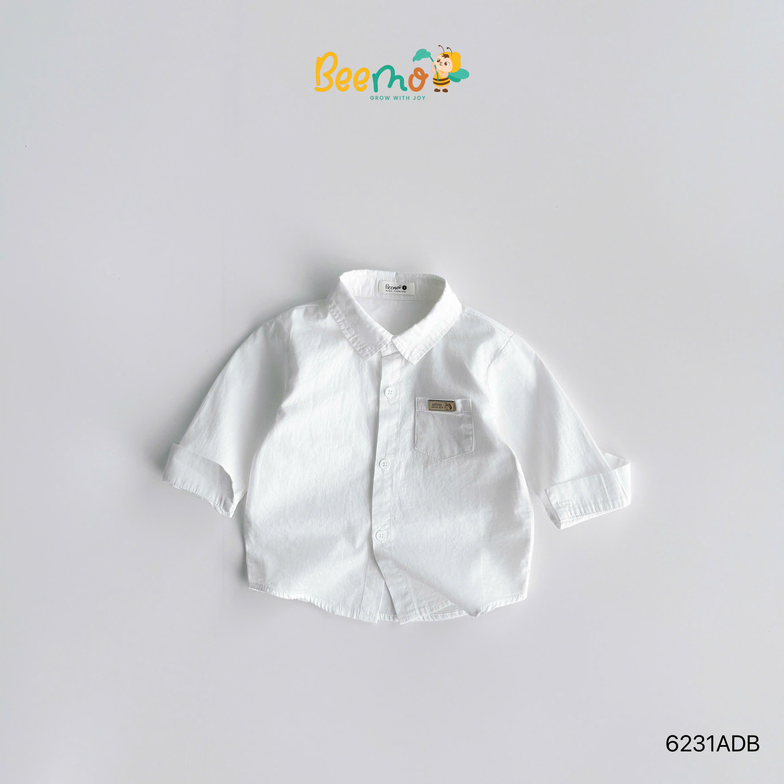 Áo sơ mi cổ đức dài tay thô lụa phối tag da Beemo