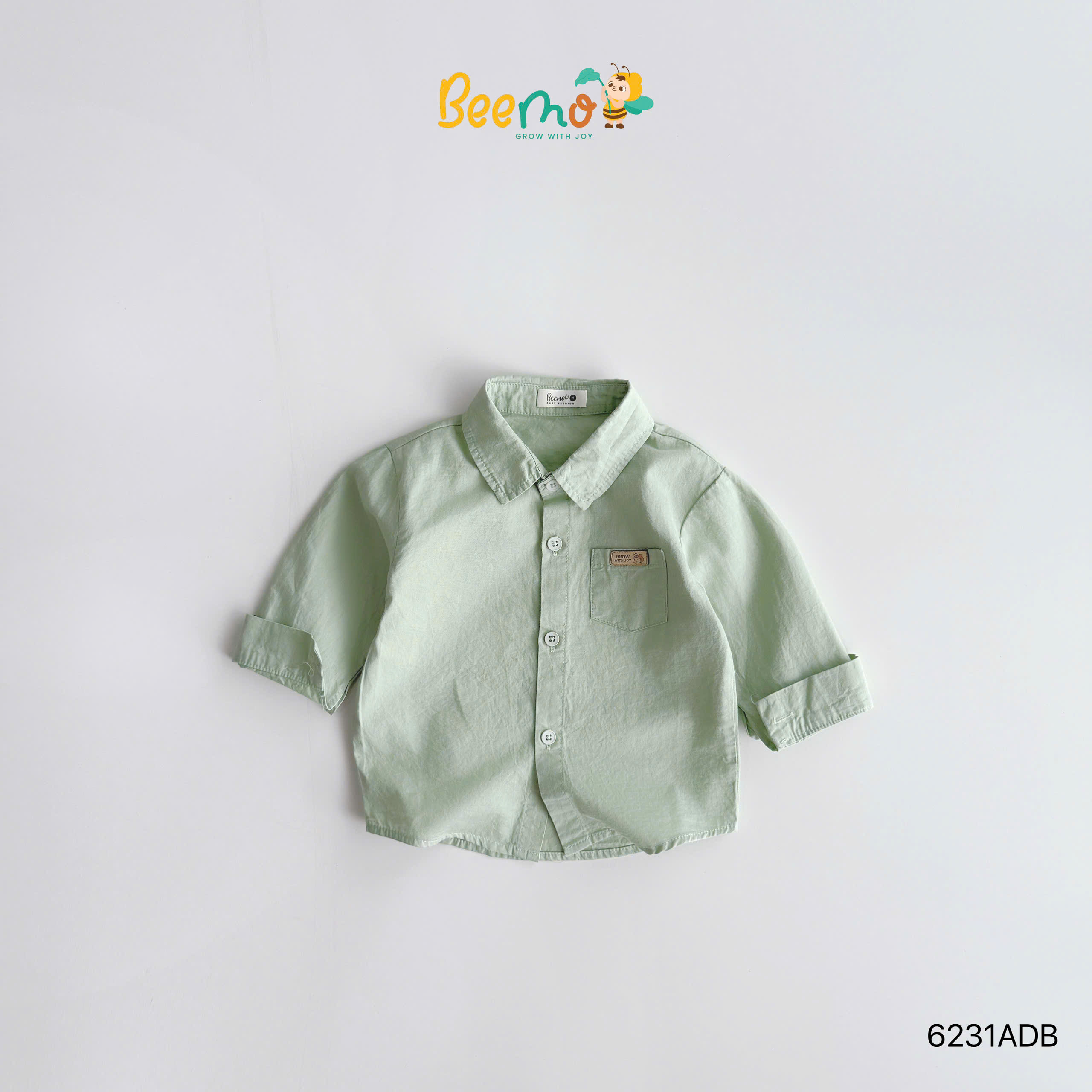 Áo sơ mi cổ đức dài tay thô lụa phối tag da Beemo