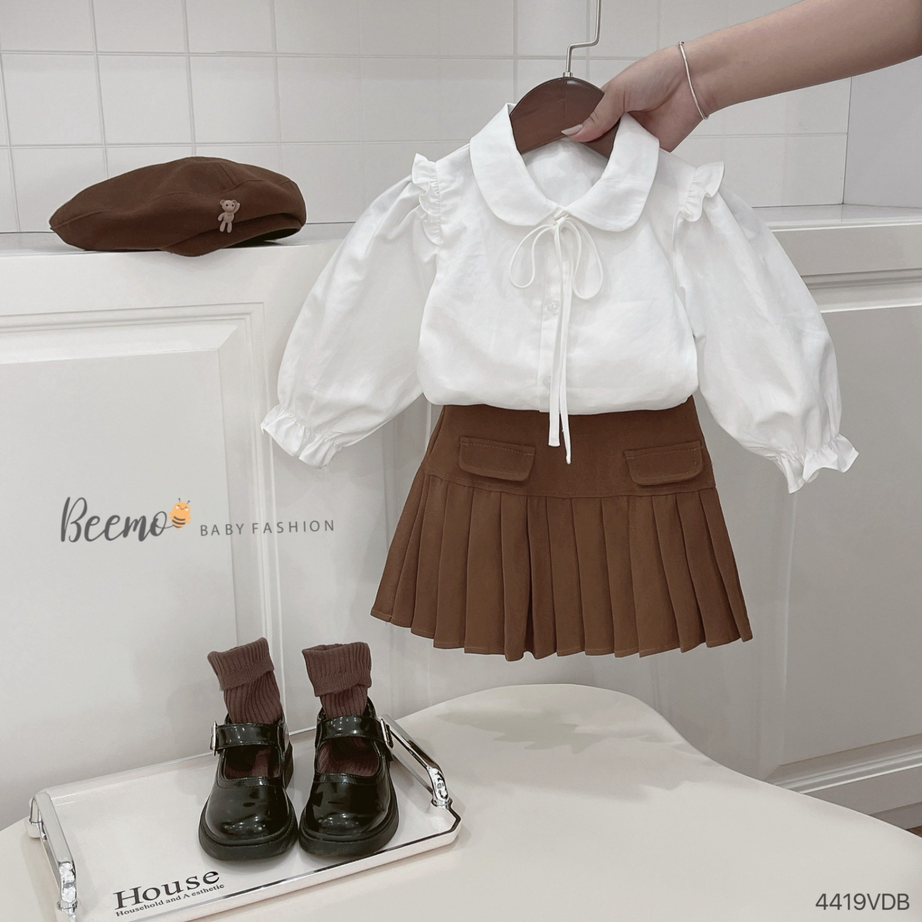 Chân váy xếp ly phối nắp túi Beemo cho bé gái