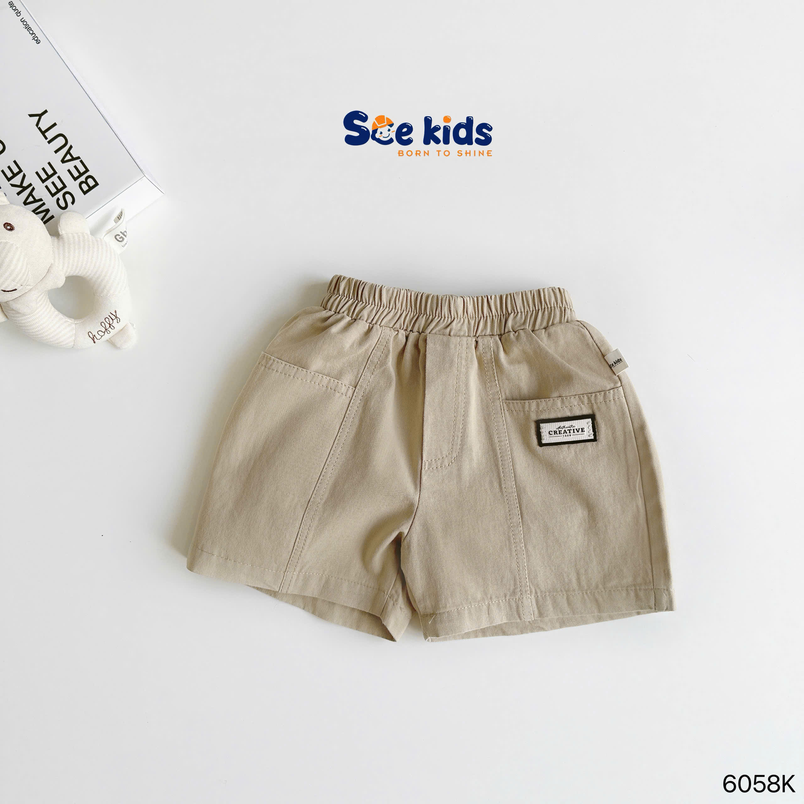 Quần đùi kaki đính tag SCE KIDS