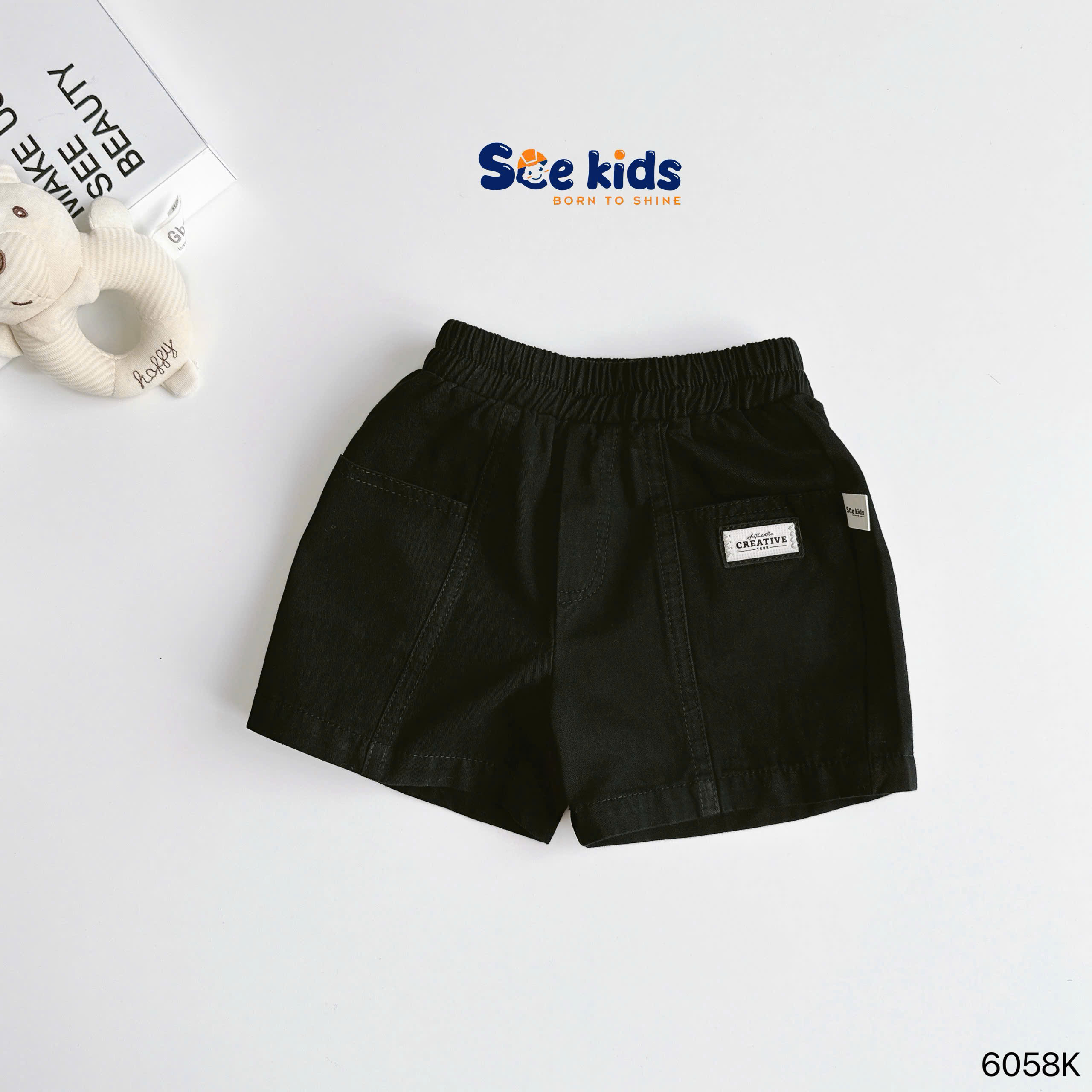 Quần đùi kaki đính tag SCE KIDS