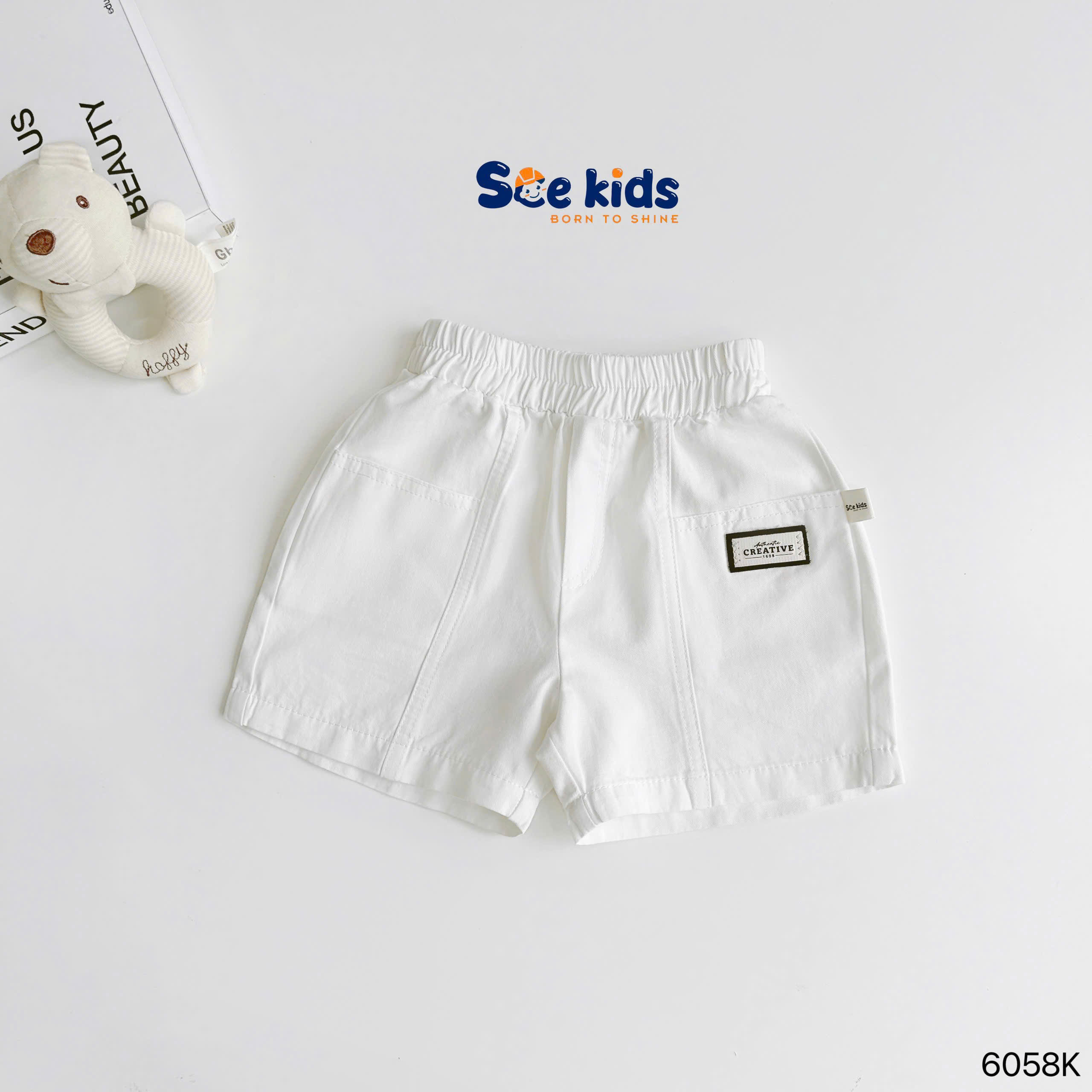 Quần đùi kaki đính tag SCE KIDS