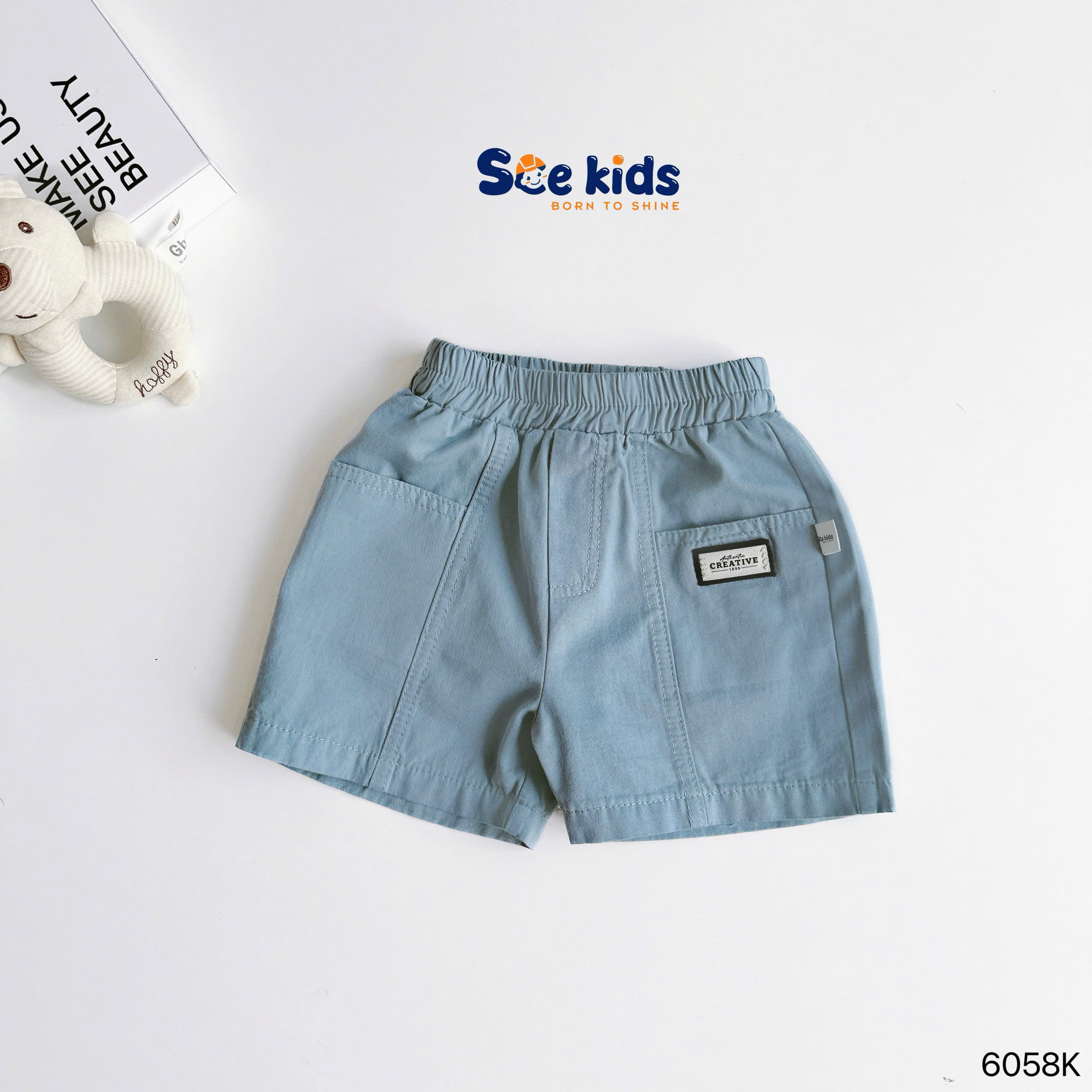 Quần đùi kaki đính tag SCE KIDS