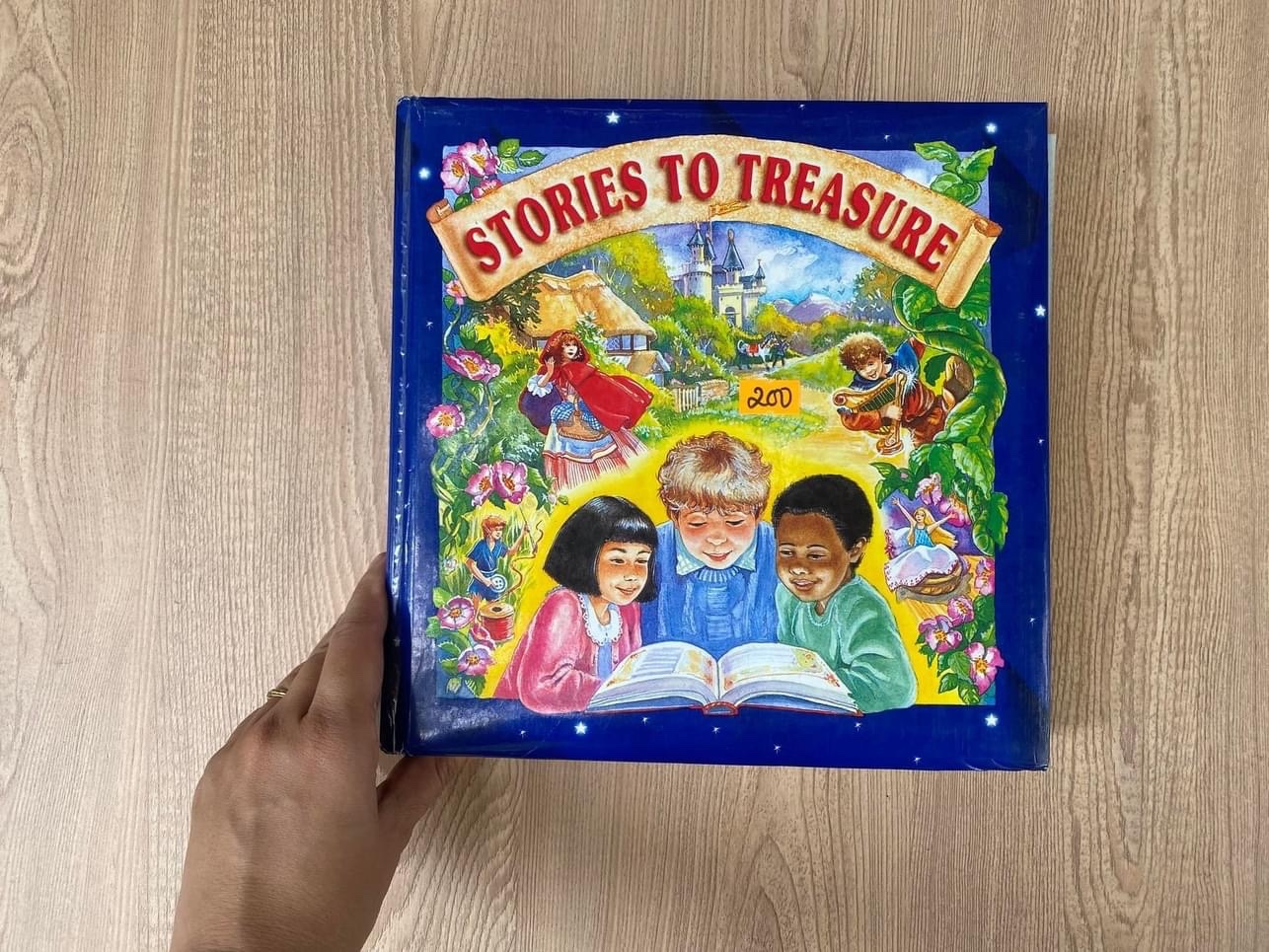 STORIES TO TREASURE Bìa cứng mới 95% OSB2611