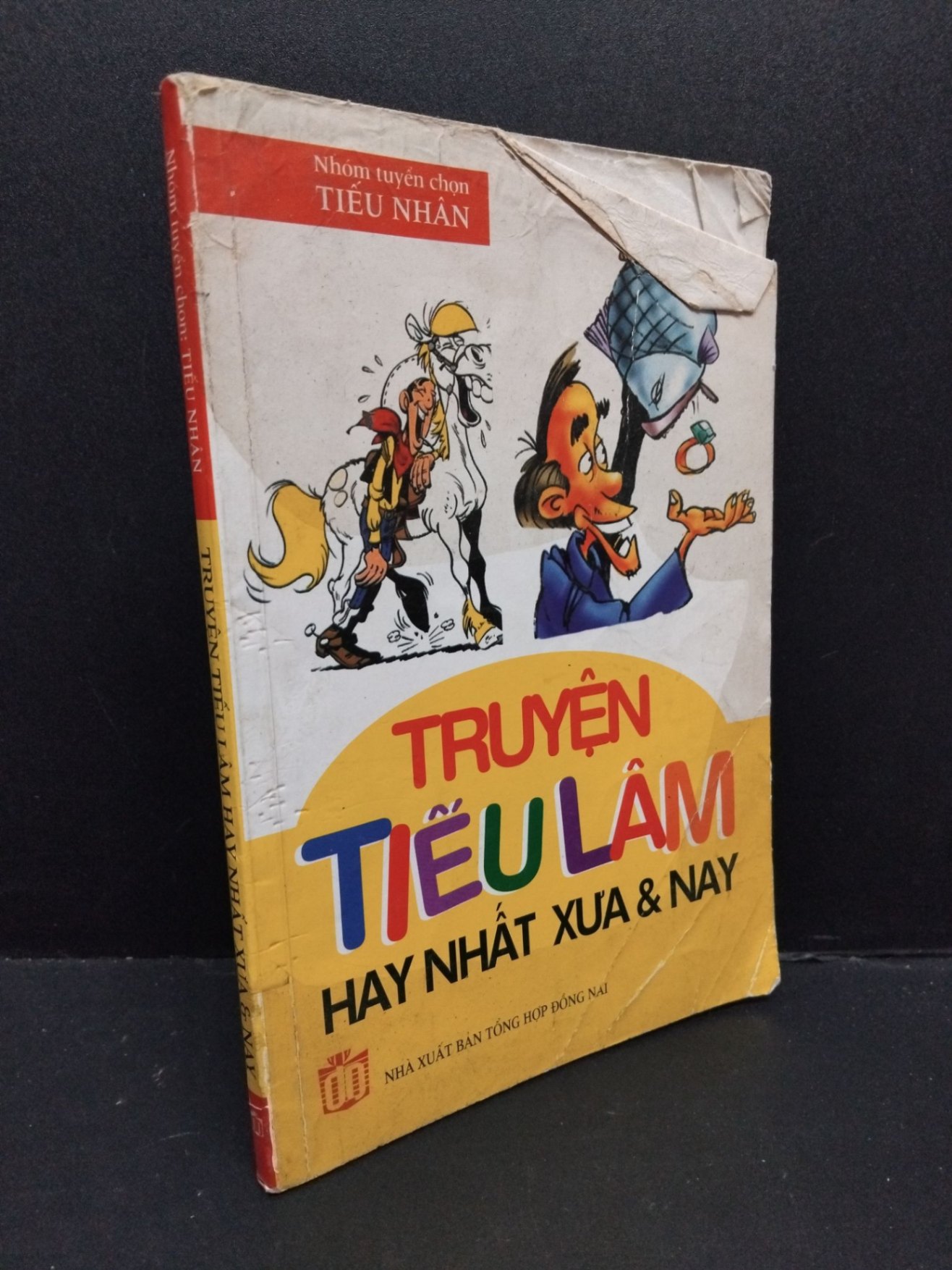 Truyện tiếu lâm hay nhất xưa và nay mới 70% bẩn bìa ố vàng rách trang cuối HCM2809 VĂN HỌC (NSX)