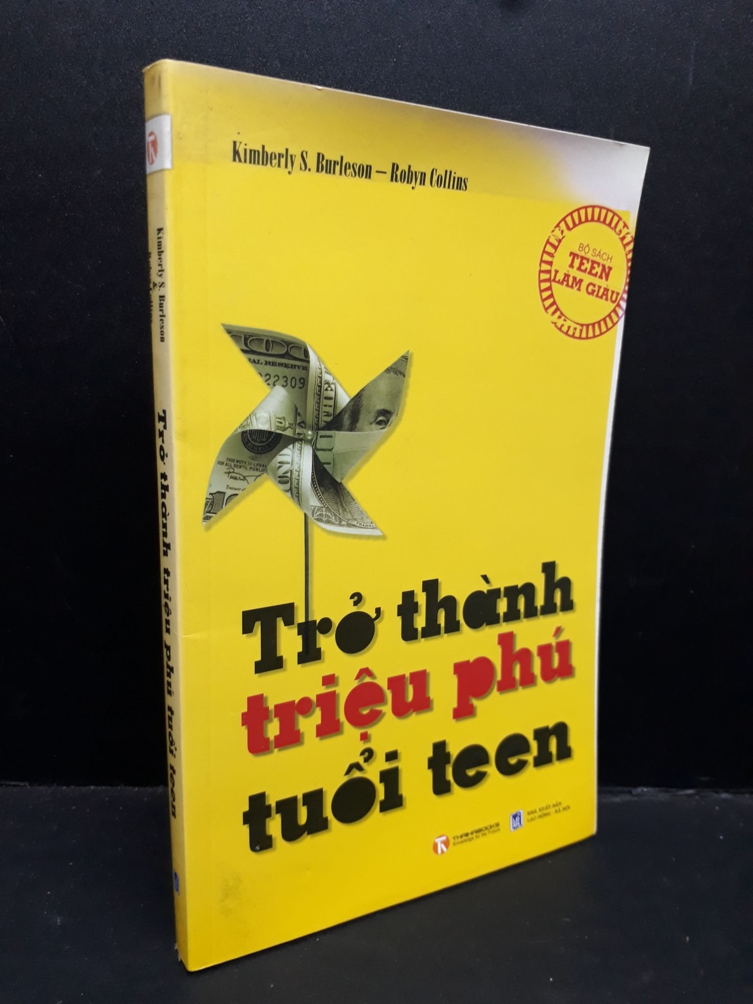 Trở thành triệu phú tuổi teen mới 80% bẩn bìa, ố nhẹ 2009 HCM1410 Kimberly S.Burleson - Robyn Collins VĂN HỌC (NSX)