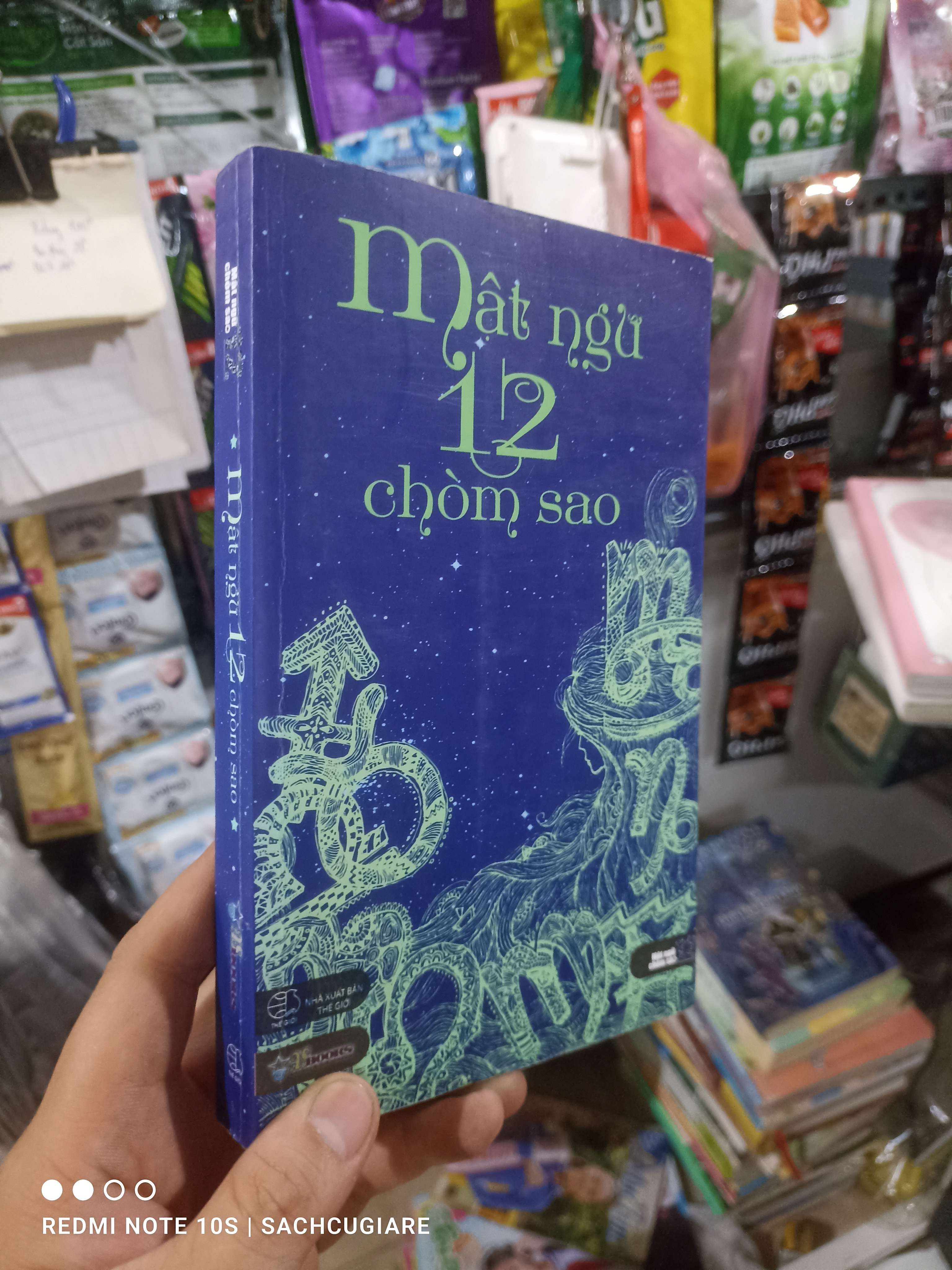 Mật ngữ 12 chòm sao 2015 mới 80% ố Sách tôn giáo - tâm linh HCM2702