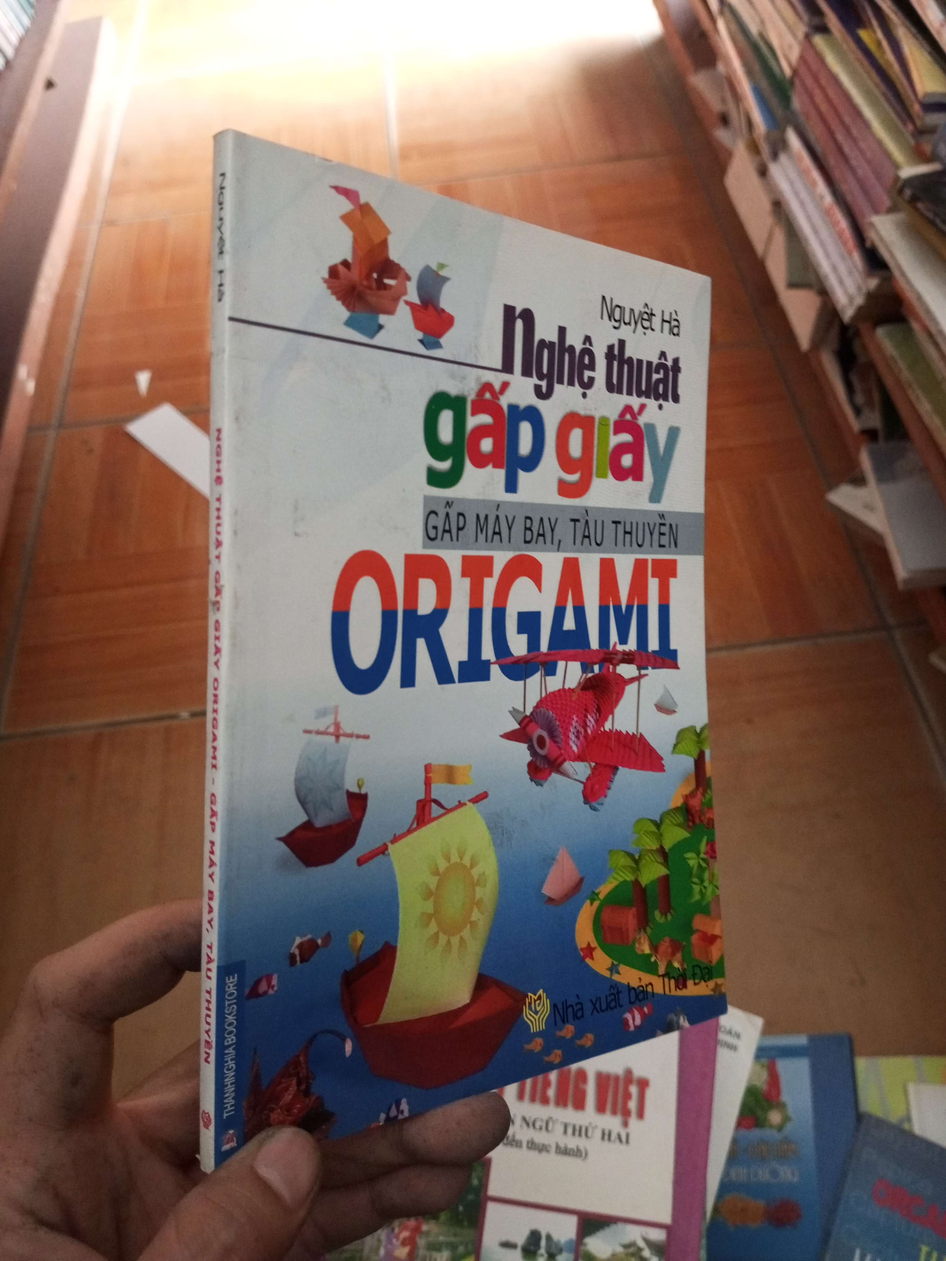 Nghệ thuật gấp giấy origami gấp máy bay tàu thuyền - Nguyệt Hà 2010 VAVO-AK18
