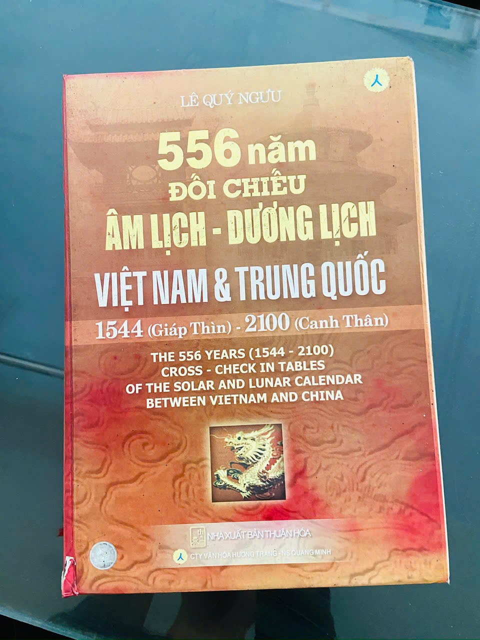 556 năm đối chiếu Âm lịch Dương lịch Việt Nam & Trung Quốc - Lê Quý Ngưu Sách tôn giáo - tâm linh VAVO1004