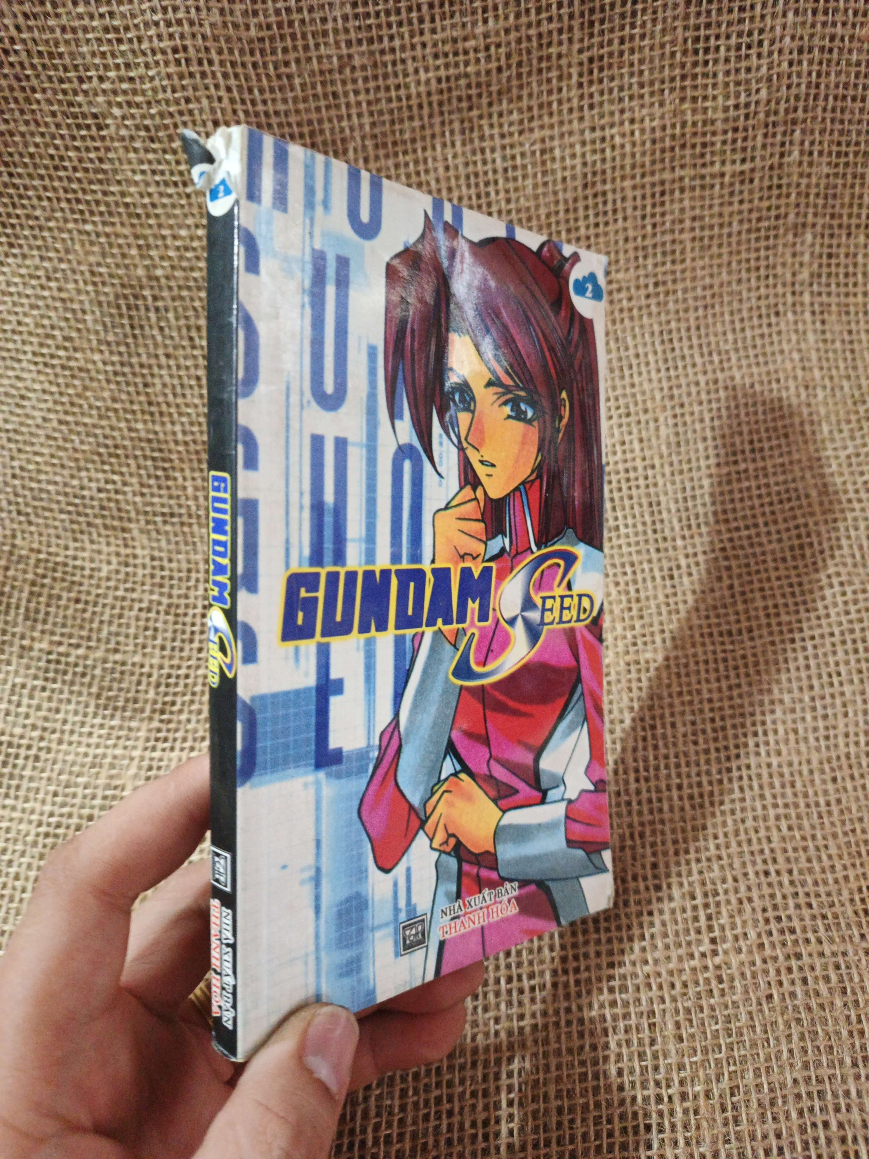GUNDAM SEED 2 mới 80% (Truyện tranh ) HLSC80526