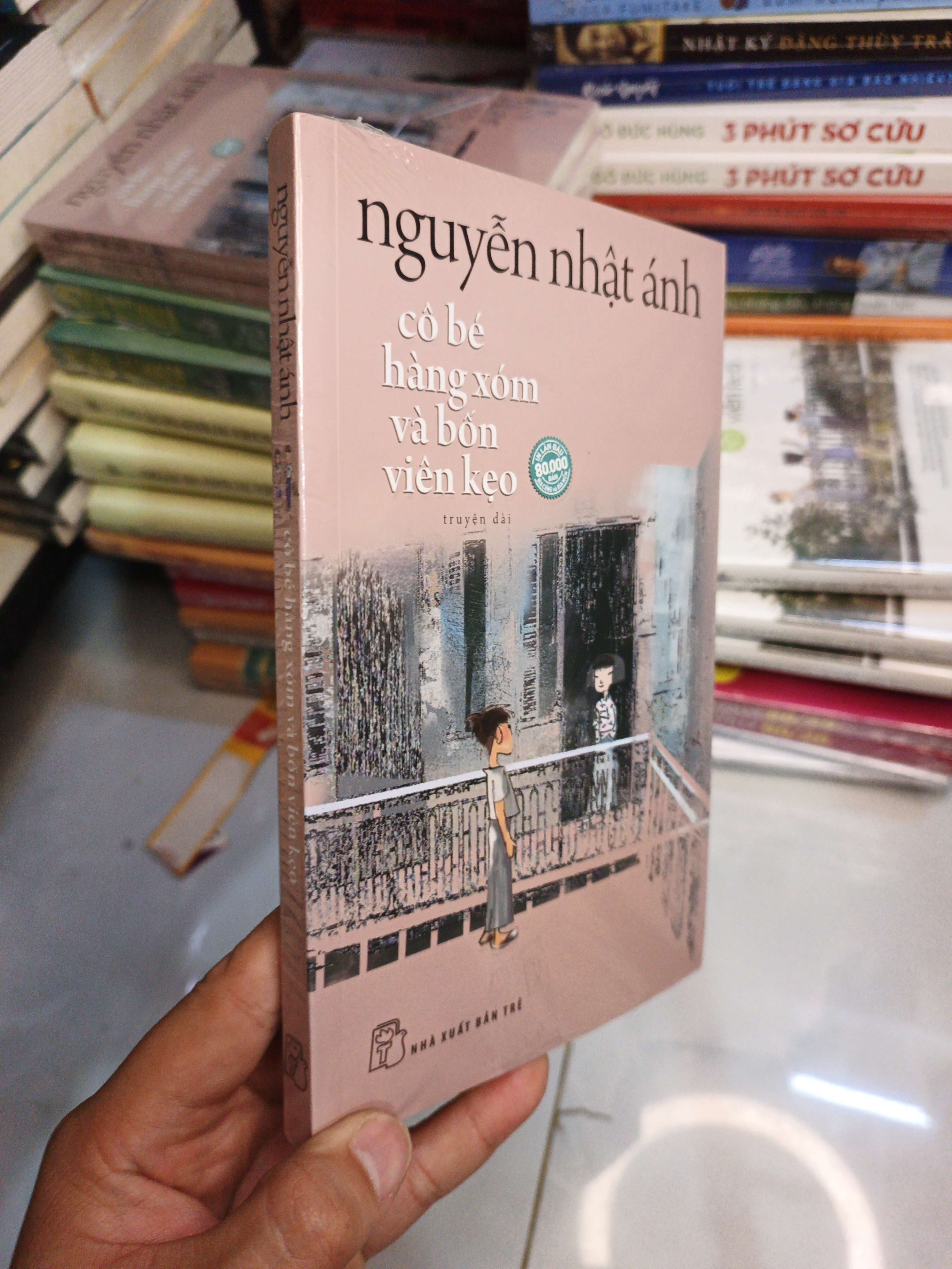 Cô Bé Hàng Xóm Và Bốn Viên Kẹo - Nguyễn Nhật Ánh mới 100% (Sách văn học) NENA