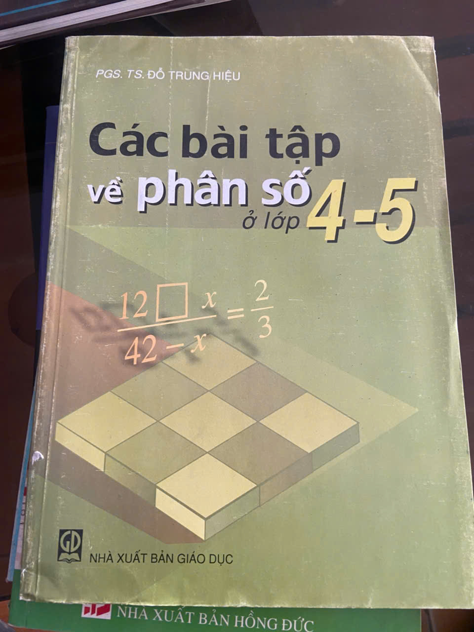 Các bài tập về phân số ở lớp 4 5 - Đỗ Trung Hiệu Mới 80% (Sách giáo khoa - giáo trình) VAVO
