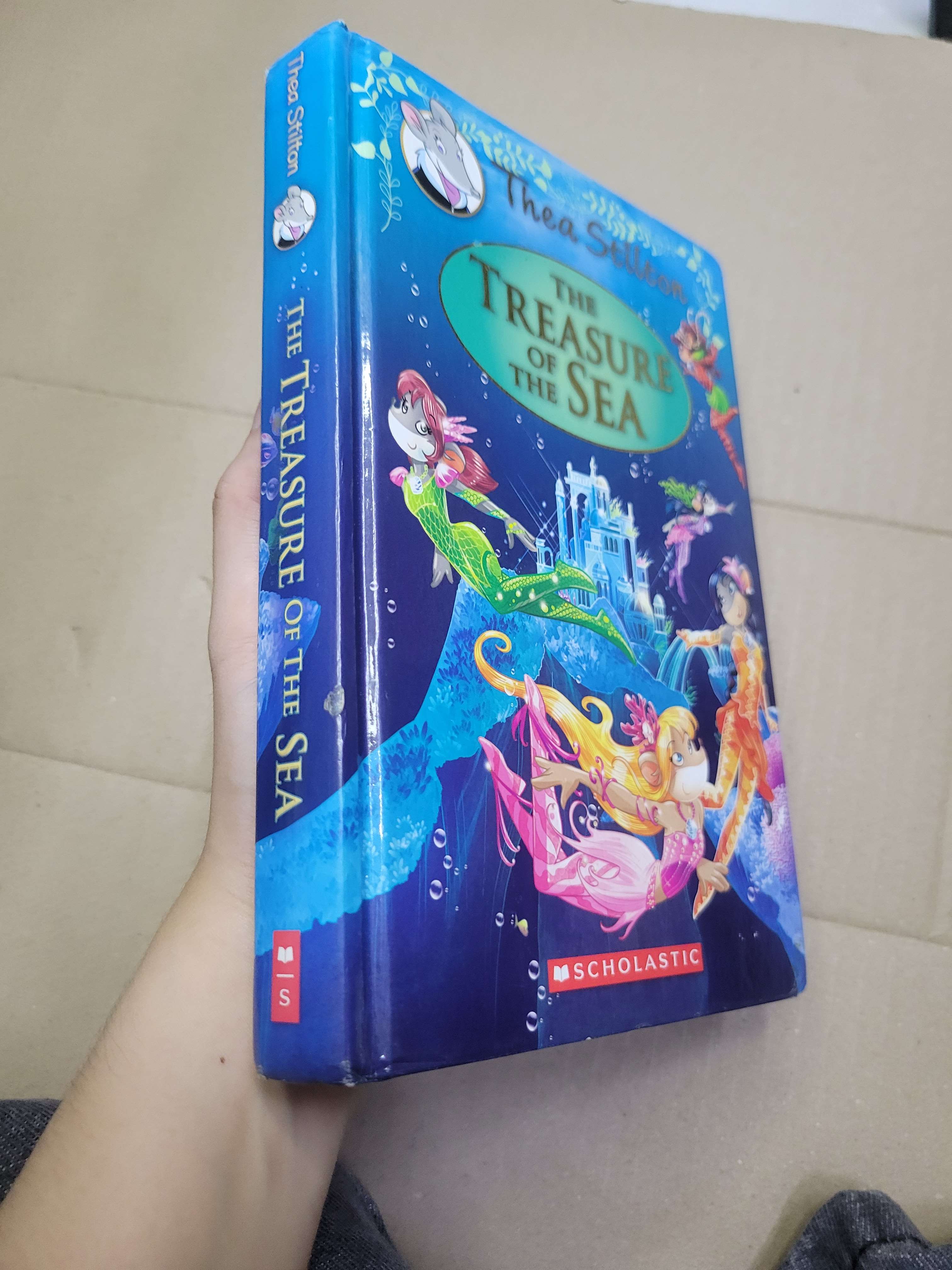 THE TREASURE OF THE SEA - THEA STILTON mới 70% bìa cứng, bẩn bìa, tróc bìa (Sách ngoại) HCM