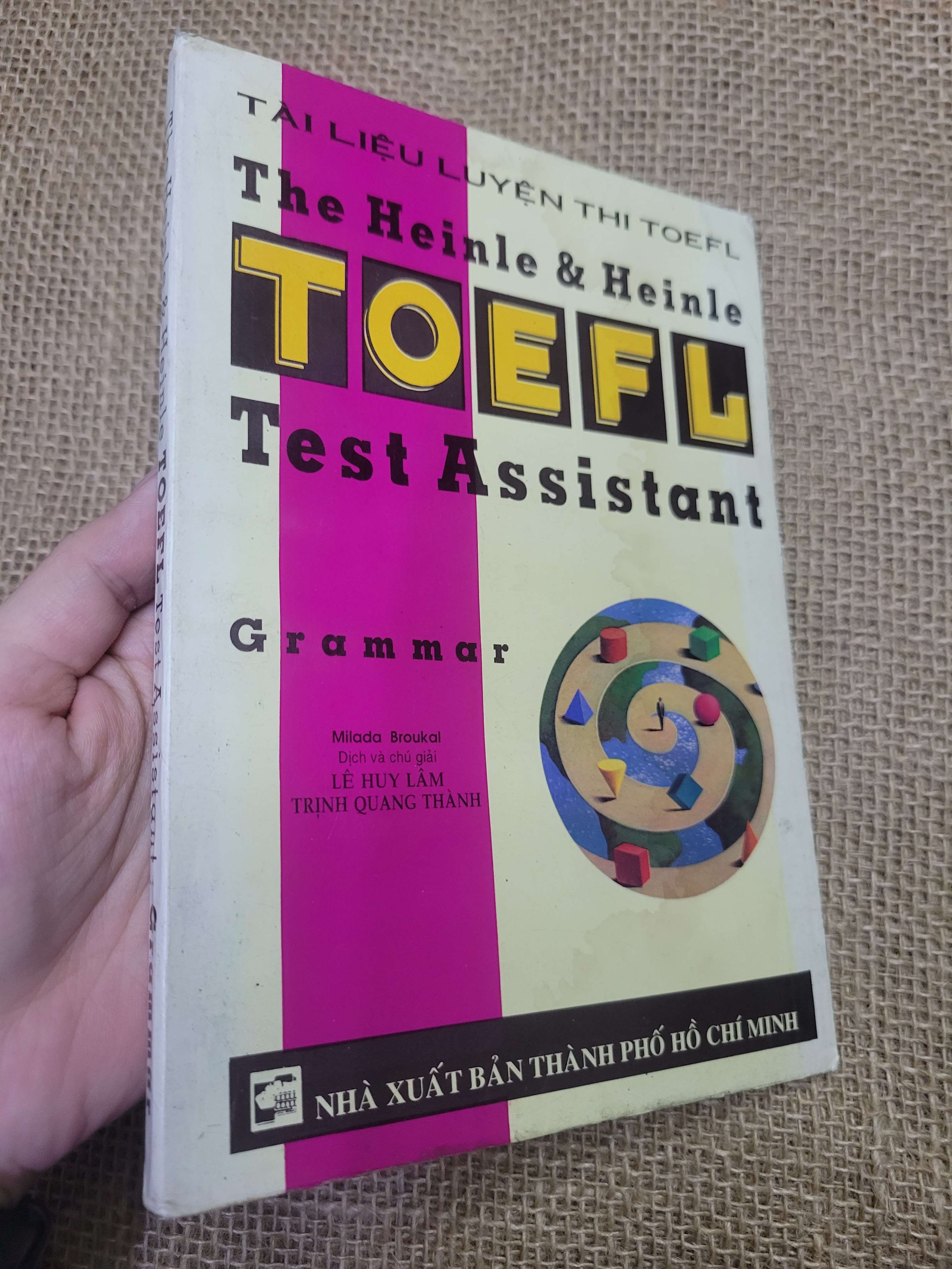 The Heinle & Heinle TOEFL Test Assistant Grammar - Milada Broukal mới 70% bẩn bìa, ố, có vệt nước (Sách tự học tiếng Anh) HLSC