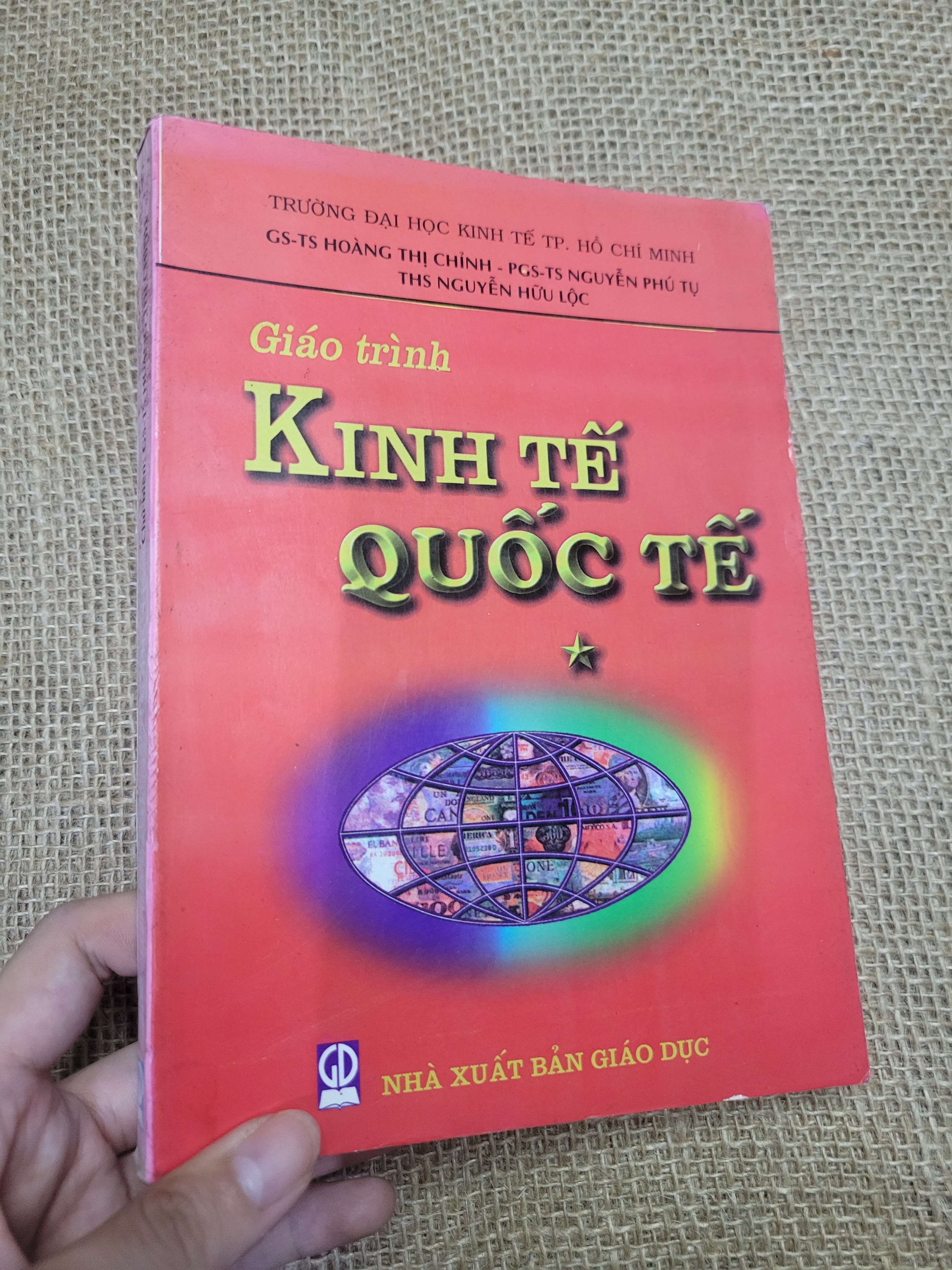 Giáo trình kinh tế quốc tế tập 1 1998 mới 80% bẩn bìa, ố, có vệt nước (Giáo trình đại học - cao đẳng) HLSC
