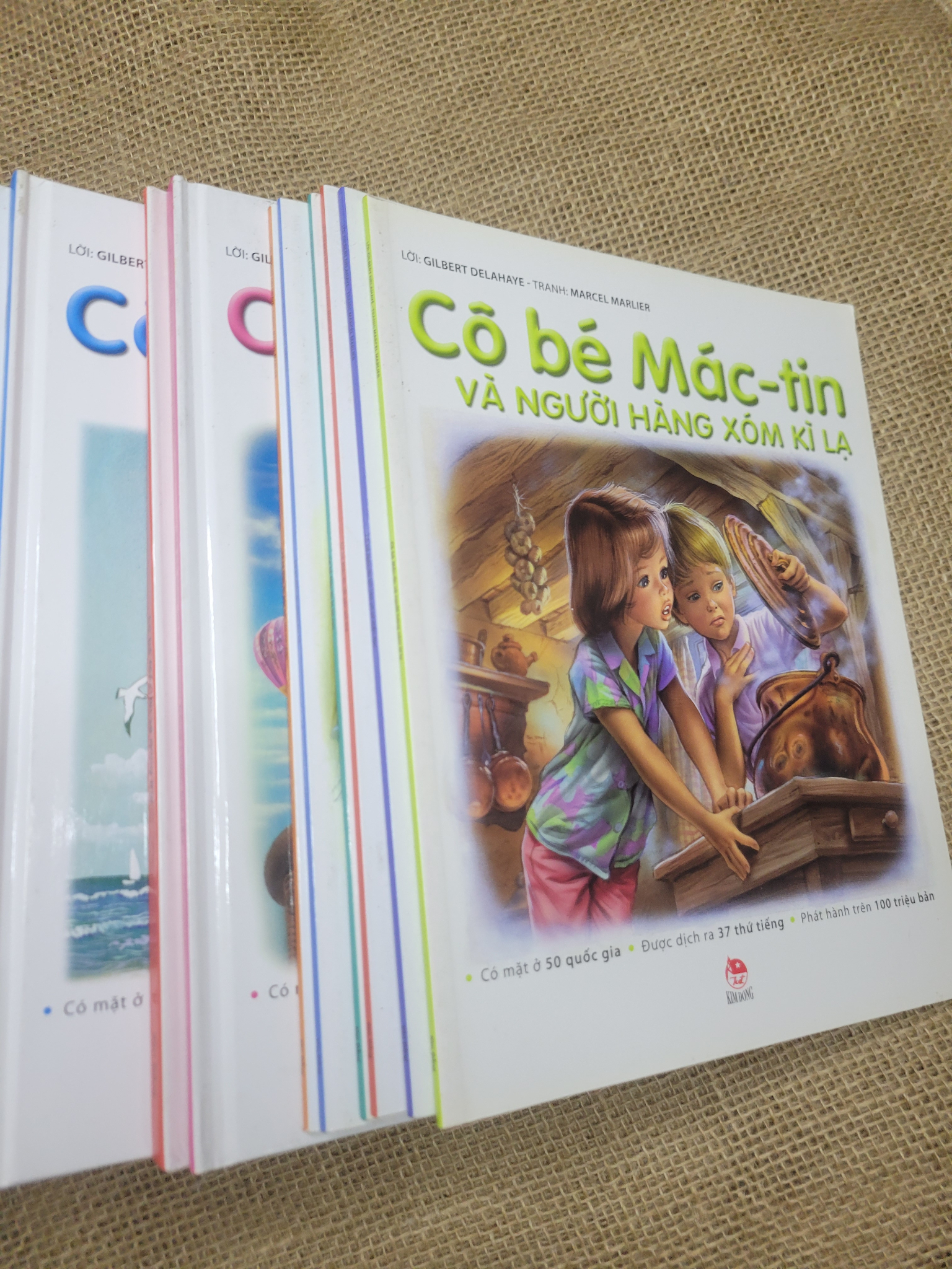 16 cuốn Cô bé Mác - tin bìa cứng sách màu mới 80% bẩn bìa, ố (Sách thiếu nhi) SPP