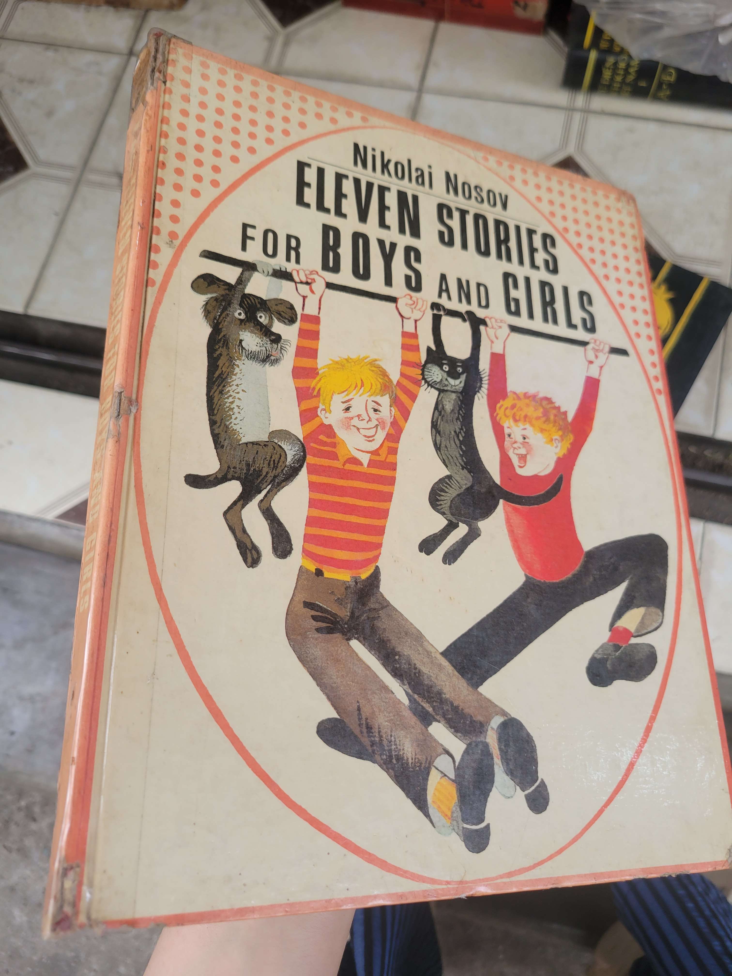Eleven stories for boys and girls - Nikolai Nosov bìa cứng, sách màu mới 70% bẩn bìa, ố, có chữ viết (Sách ngoại) BGB