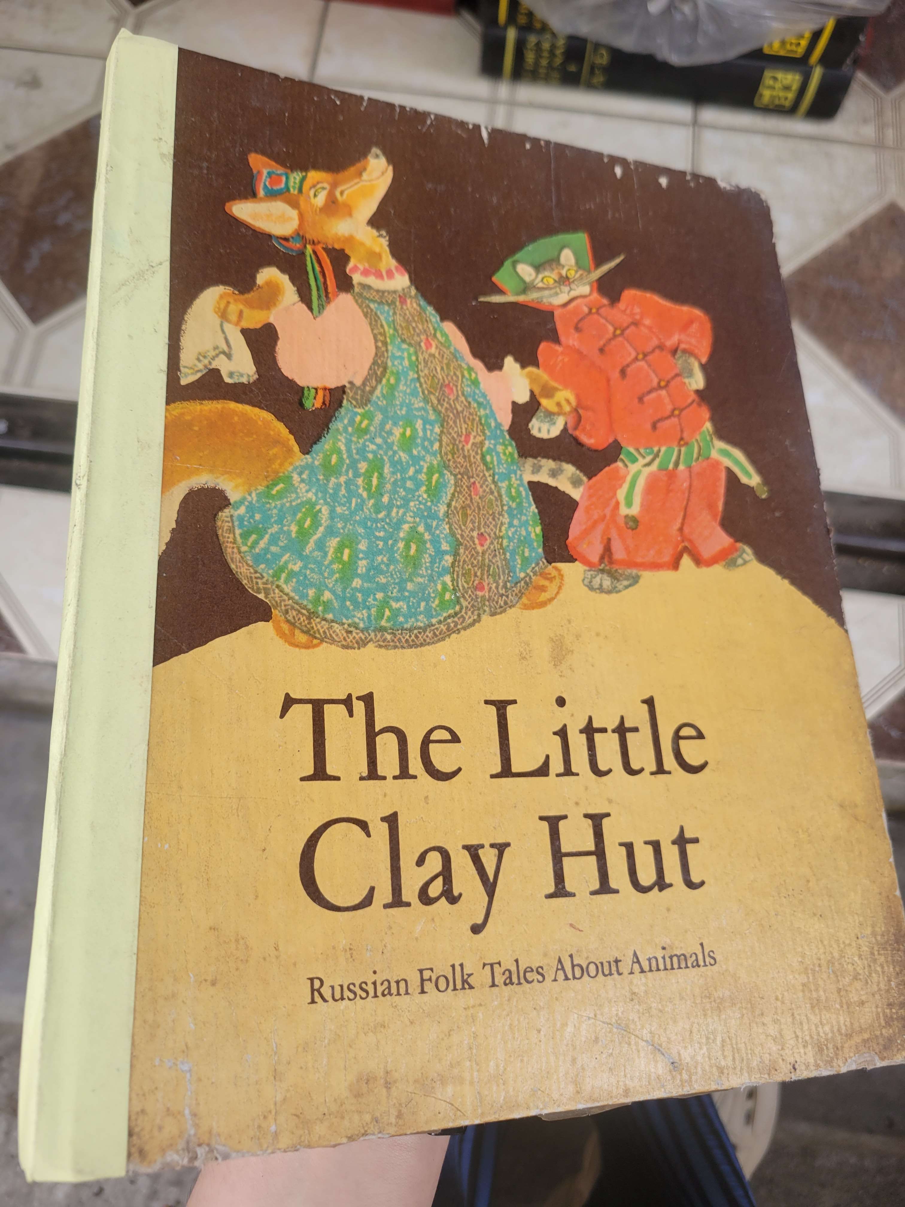 The little clay hut - Russian folk tales abouts animals bìa cứng, sách màu mới 70% bẩn bìa, ố, có chữ viết (Sách ngoại) BGB