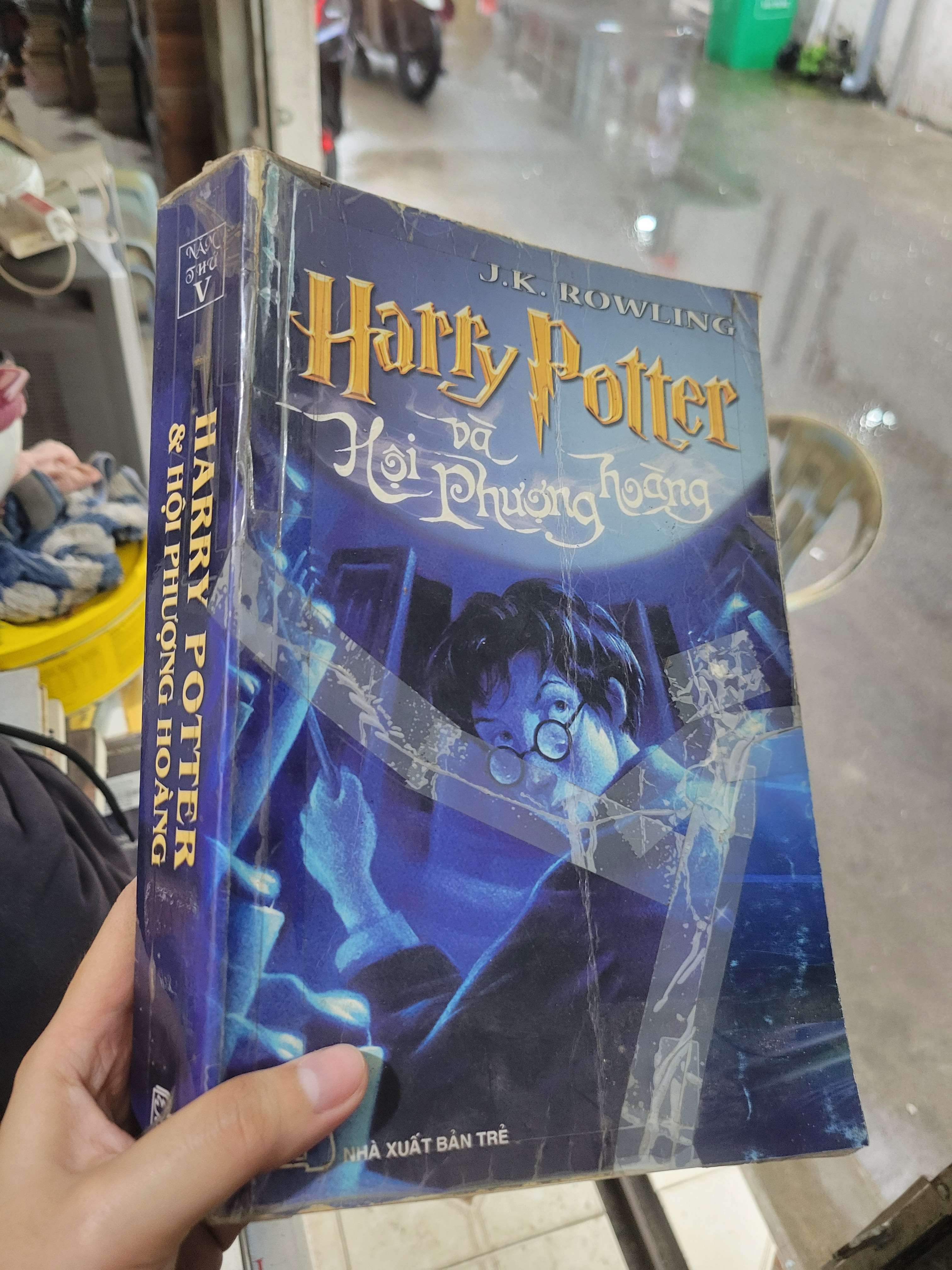 Harry Potter & Hội Phượng Hoàng - J.K. Rowling 2005 mới 70% ố, bẩn bìa (Sách văn học) BGB