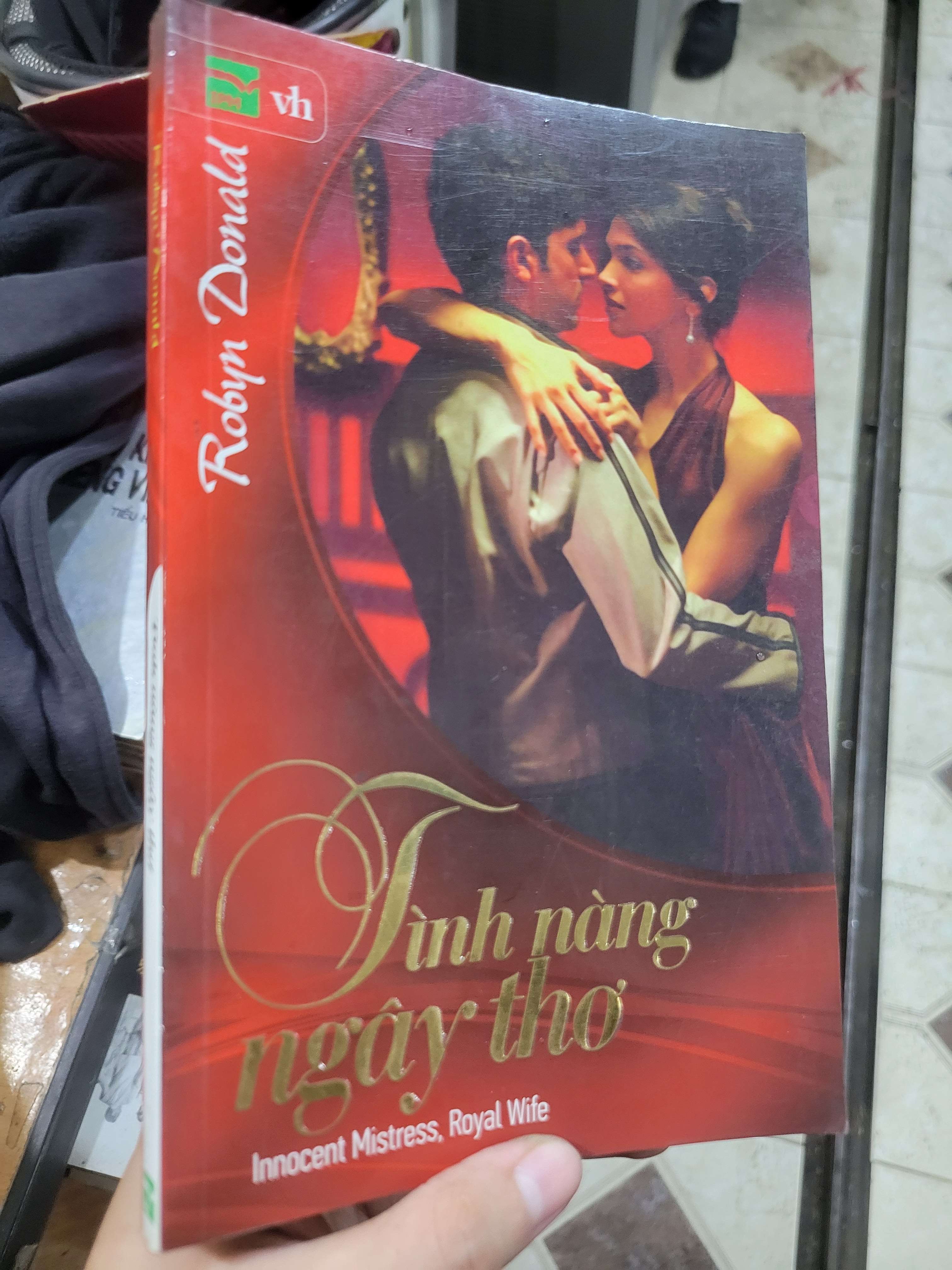 Tình nàng ngây thơ - Robyn Donald 2010 mới 80% ố, bẩn bìa (Sách văn học) BGB