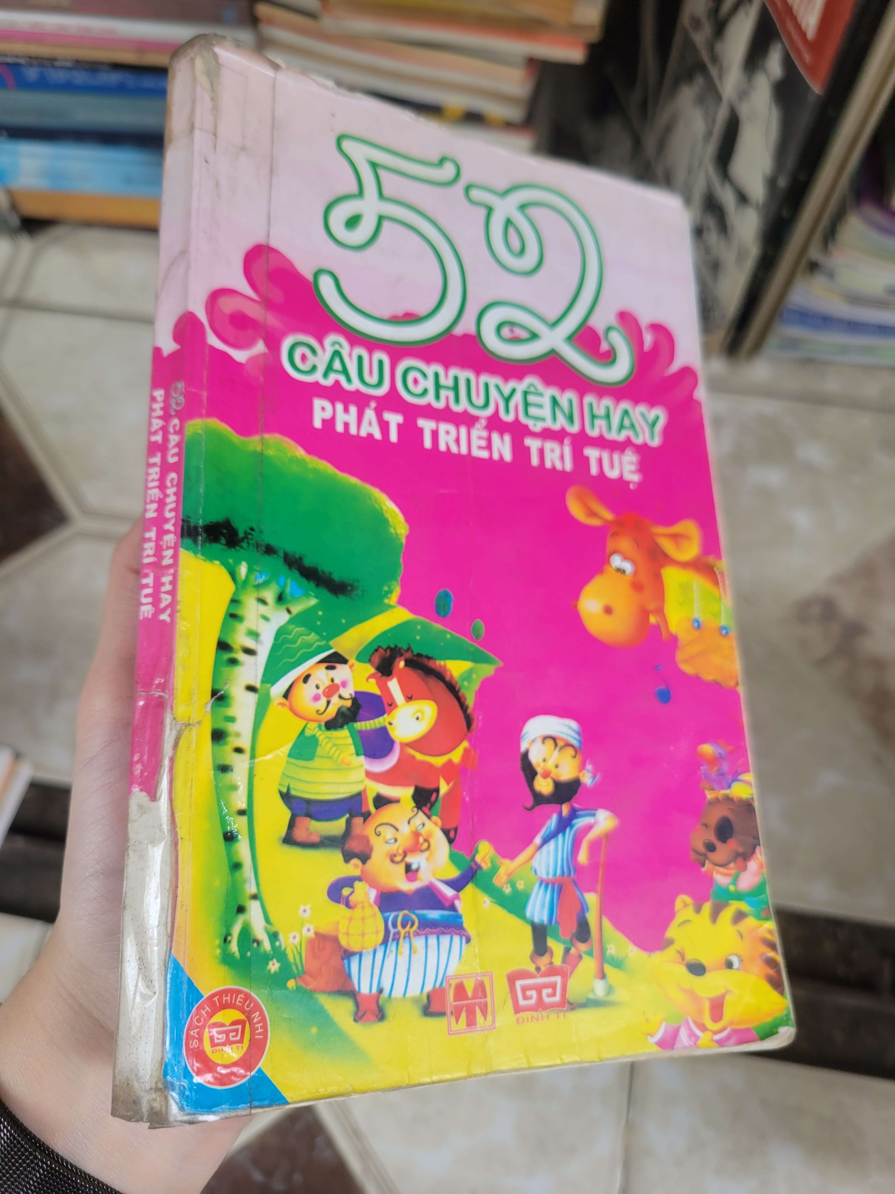 52 câu chuyện hay phát triển trí tuệ - Ngọc Khánh 2011 mới 60% bẩn bìa, ố, tróc gáy, bung trang, có chữ viết (Sách văn học) BGB