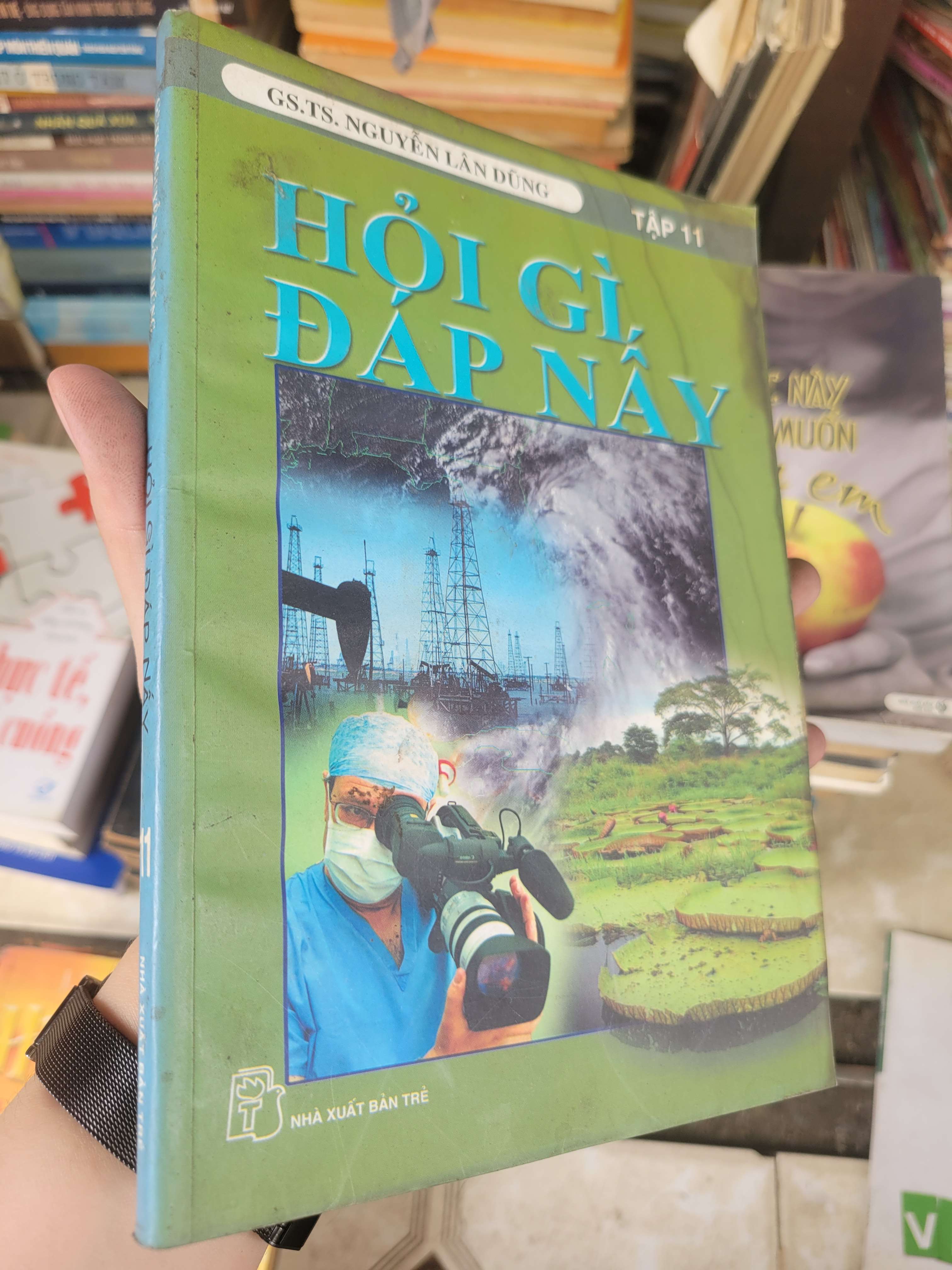 Hỏi gì đáp nấy tập 11 - Gs. Ts. Nguyễn Lân Dũng 2007 mới 60% bẩn bìa, ố, có vệt nước, bị ẩm (Sách kiến thức tổng hợp) BGB