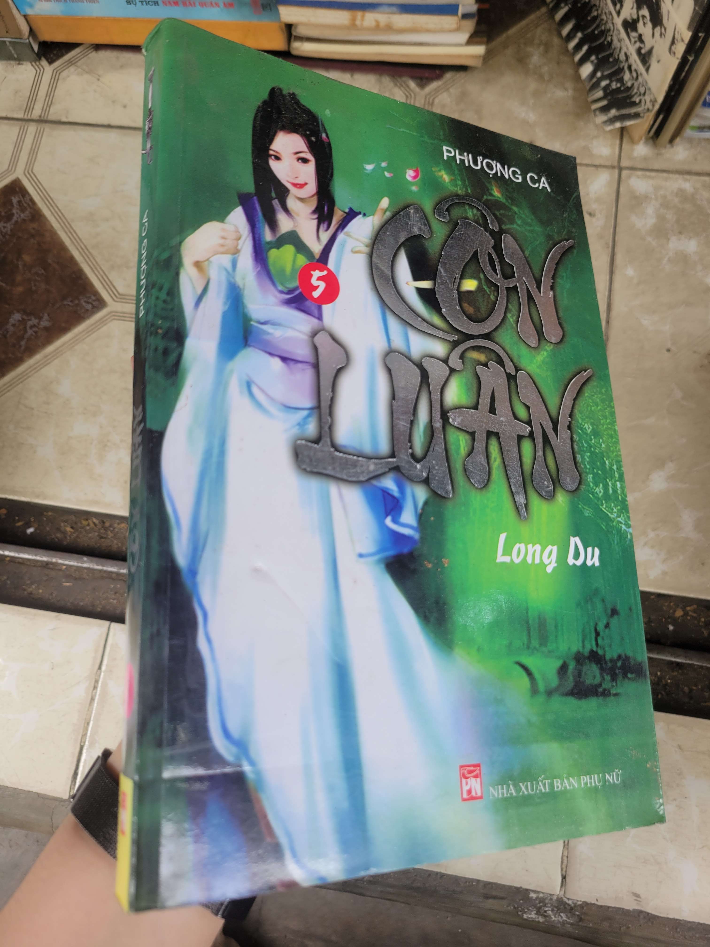 Côn luân Long Du - Phượng Ca 2009 mới 80% ố, bẩn bìa (Sách văn học) BGB