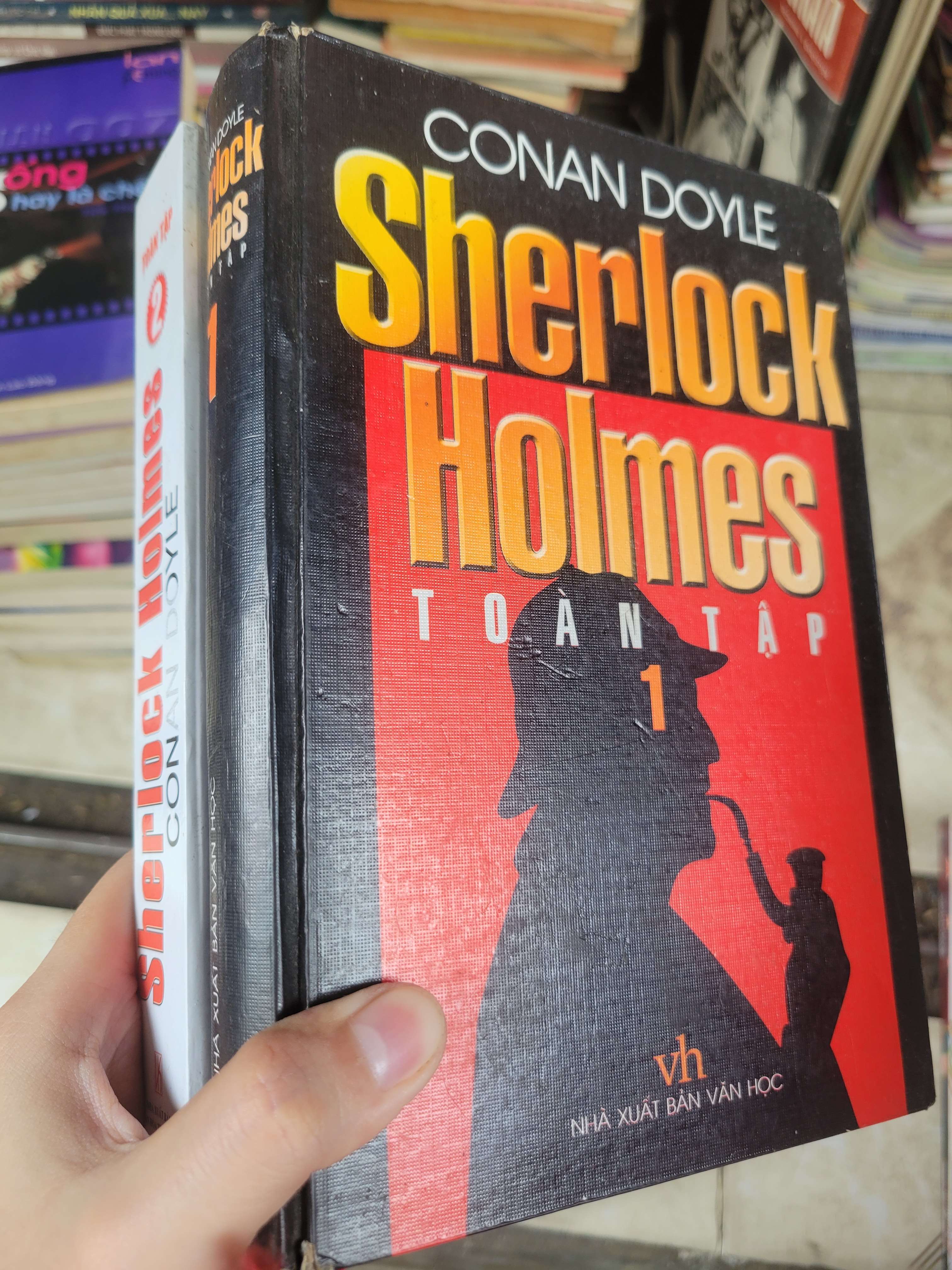 2 cuốn Sherlock Holmes - Conan Doyle bìa cứng mới 80% ố, bẩn bìa (Sách văn học) BGB