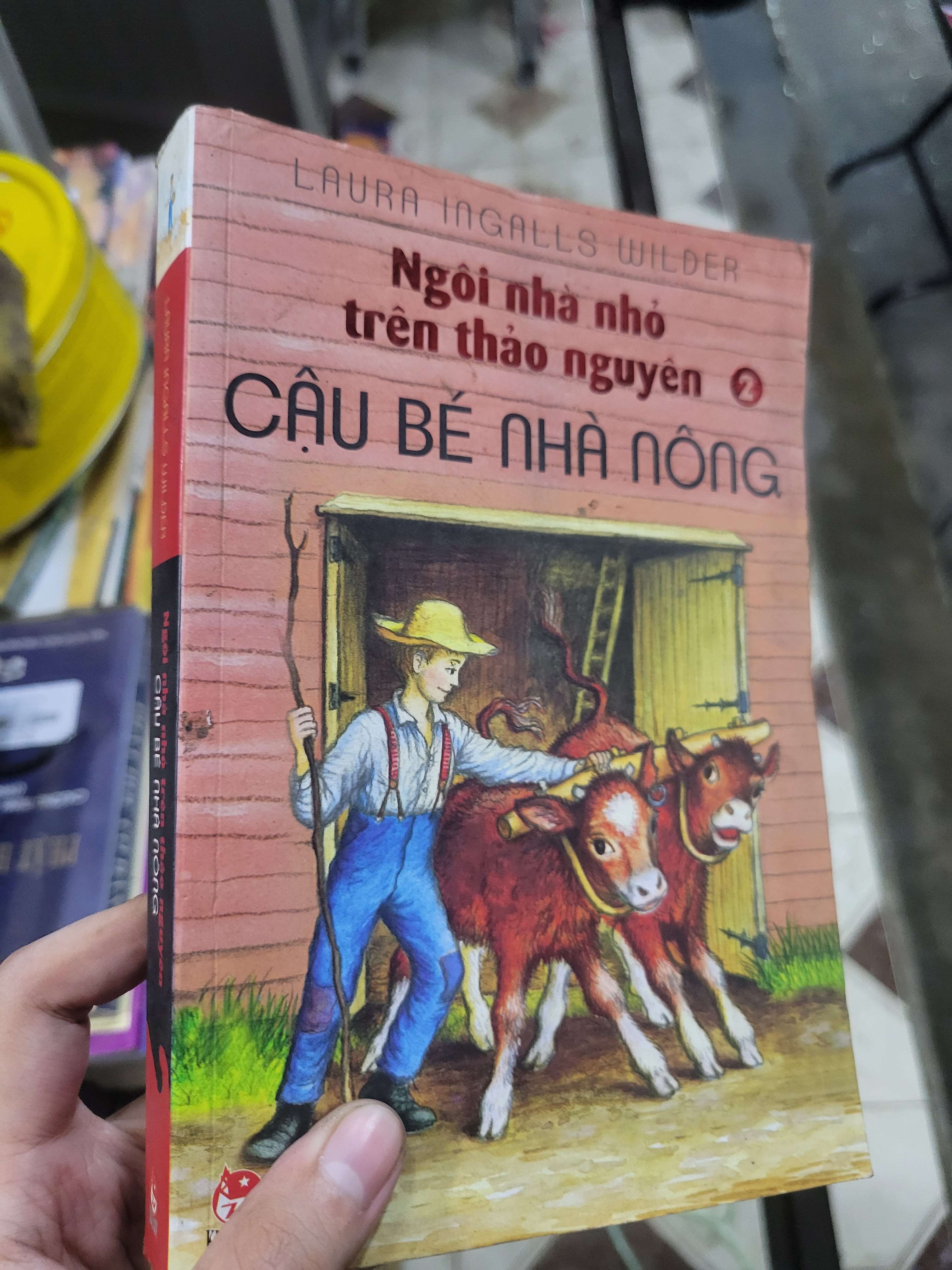 Ngôi nhà nhỏ trên thảo nguyên 2: Cậu bé nhà nông - Laura Ingalls Wilder 2013 mới 70% bẩn bìa, ố, có mộc (Sách văn học) BGB