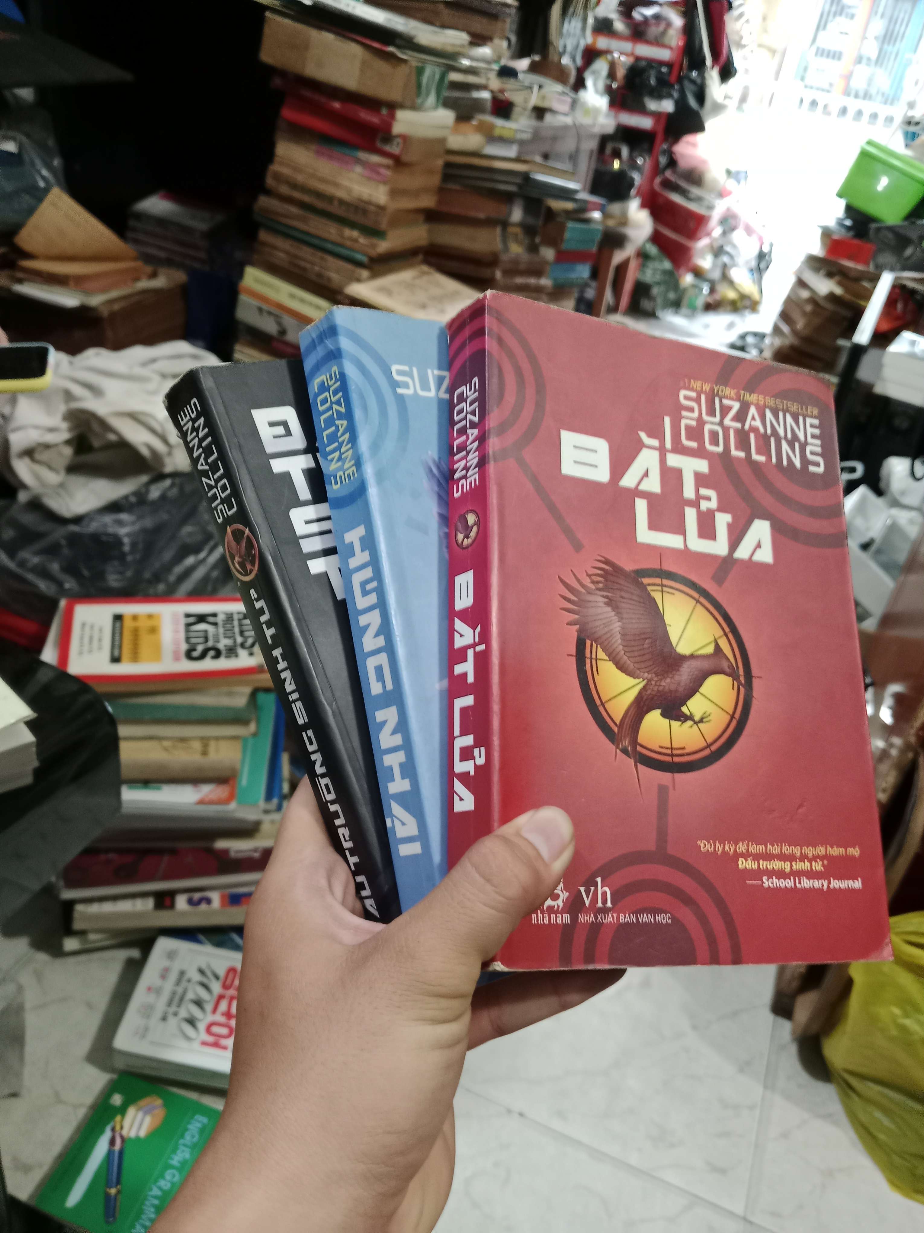 3 cuốn Đấu trường sinh tử - Suzanne Collins 2015 mới 80% (Sách văn học) KSX