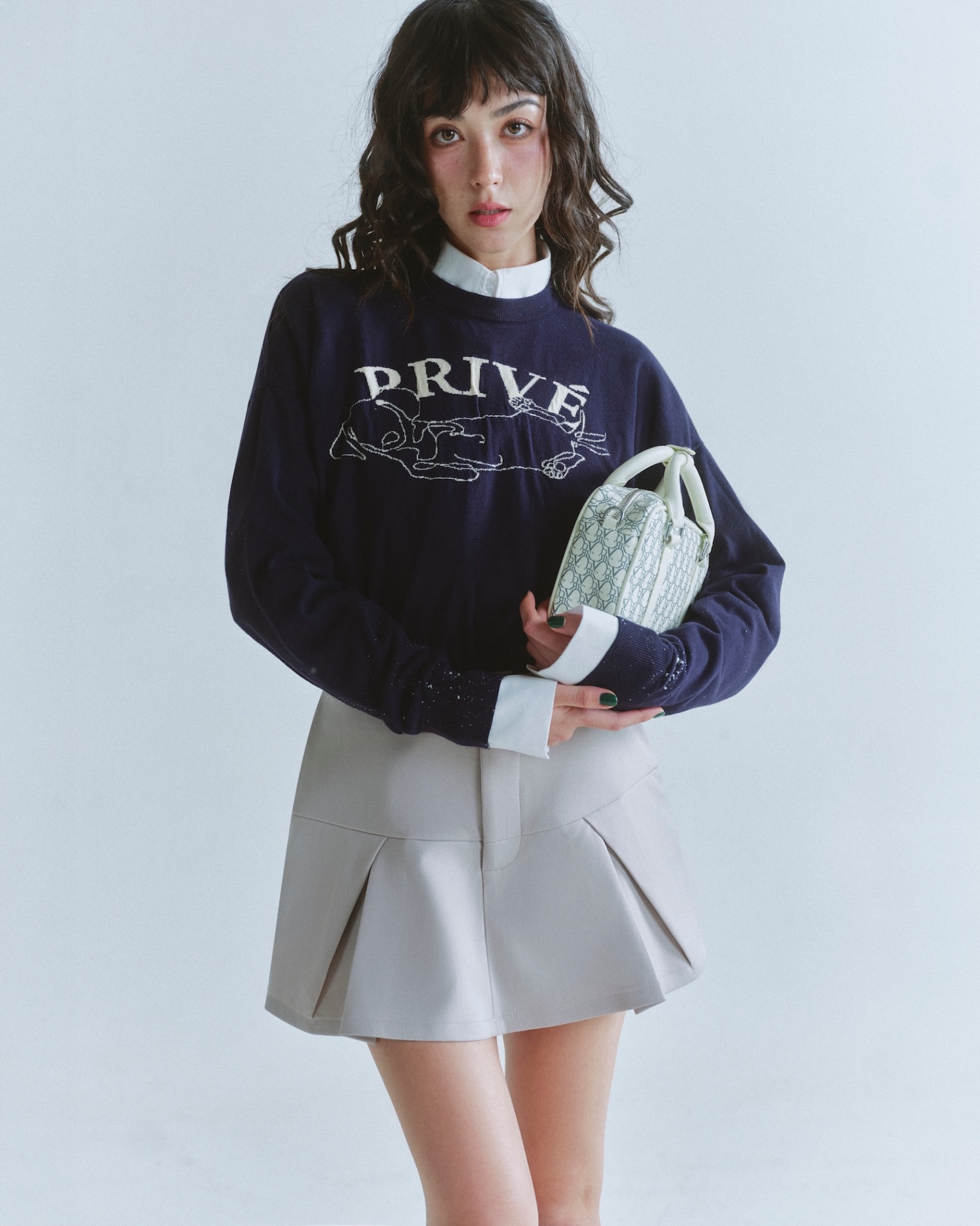 DVRK PRIVÉ LOW-RISE PLEATED MINI SKIRT - LIGHT GREY